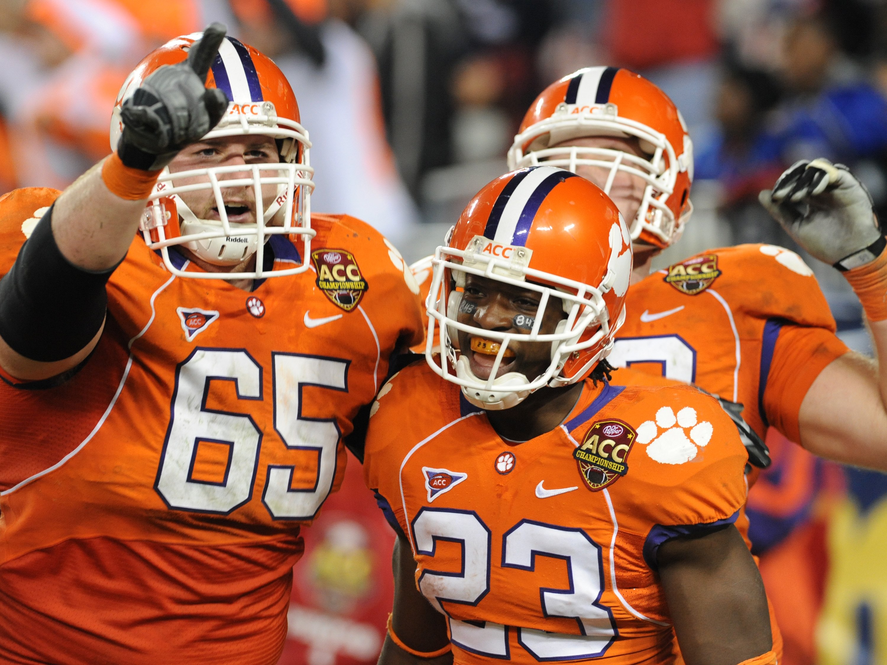 TAMPA, FL - NOVEMBER 28: Running back Andre Ellington #23 of the Clemson Tigers celebrates a touchdown run with guard Thomas Austin #65 against the Georgia Tech Yellow Jackets in the 2009 ACC Football Championship Game December 5, 2009 at Raymond James St