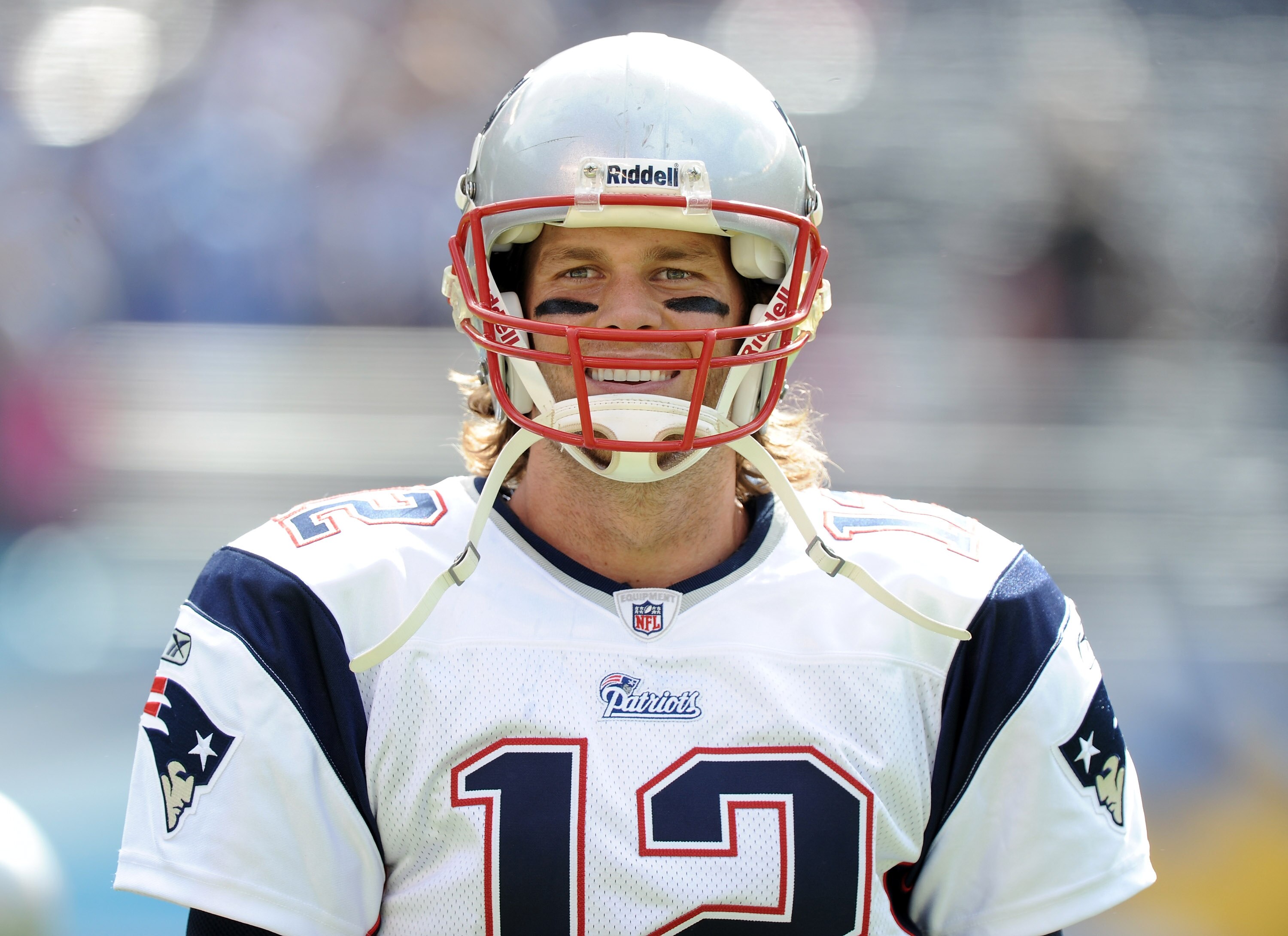 SAN DIEGO - OCTOBER 24:  Tom Brady #12 of the New England Patriots smiles during warm up against the San Diego Chargers at Qualcomm Stadium on October 24, 2010 in San Diego, California.  (Photo by Harry How/Getty Images)