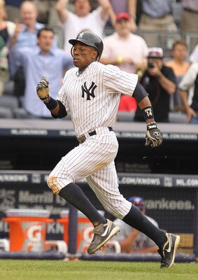 NEW YORK, NY - JUNE 16:  Curtis Granderson #14 of the New York Yankees in action against the Texas Rangers during their game on June 16, 2011 at Yankee Stadium in the Bronx borough of New York City.  (Photo by Al Bello/Getty Images)