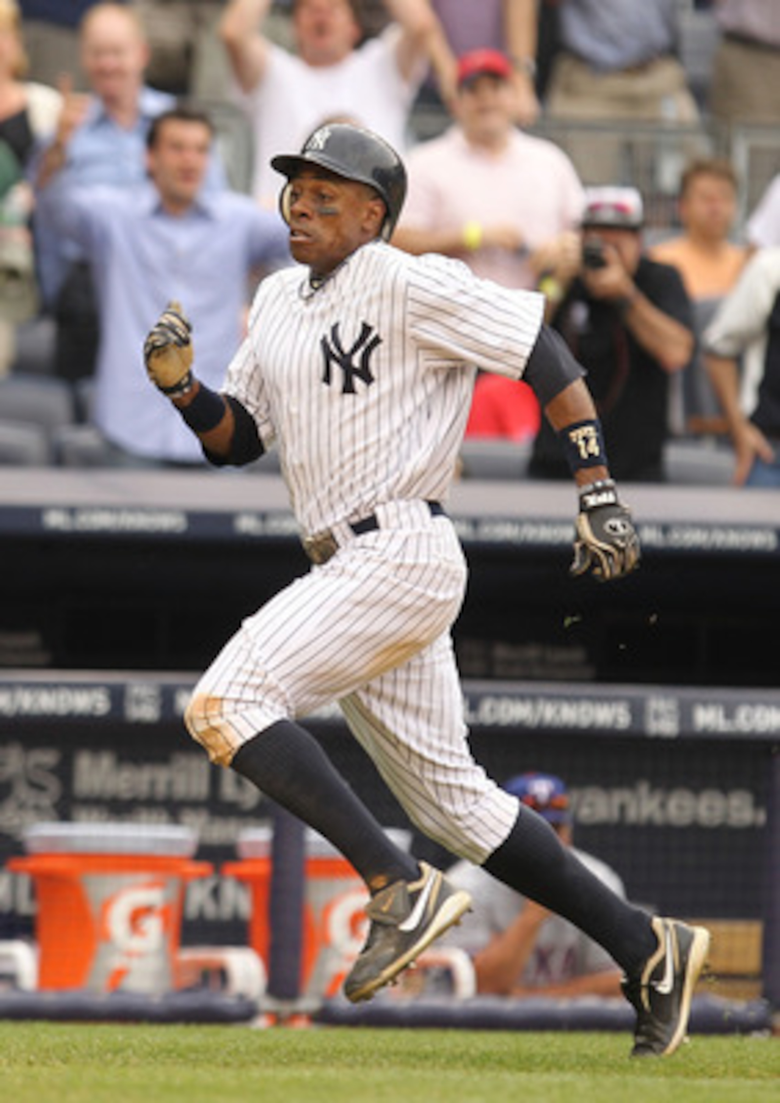NEW YORK, NY - JUNE 16: Curtis Granderson #14 of the New York Yankees in action against the Texas Rangers during their game on June 16, 2011 at Yankee Stadium in the Bronx borough of New York City. (Photo by Al Bello/Getty Images) NEW YORK, NY - JUNE 16: Curtis Granderson #14 of the New York Yankees in action against the Texas Rangers during their game on June 16, 2011 at Yankee Stadium in the Bronx borough of New York City. (Photo by Al Bello/Getty Images)