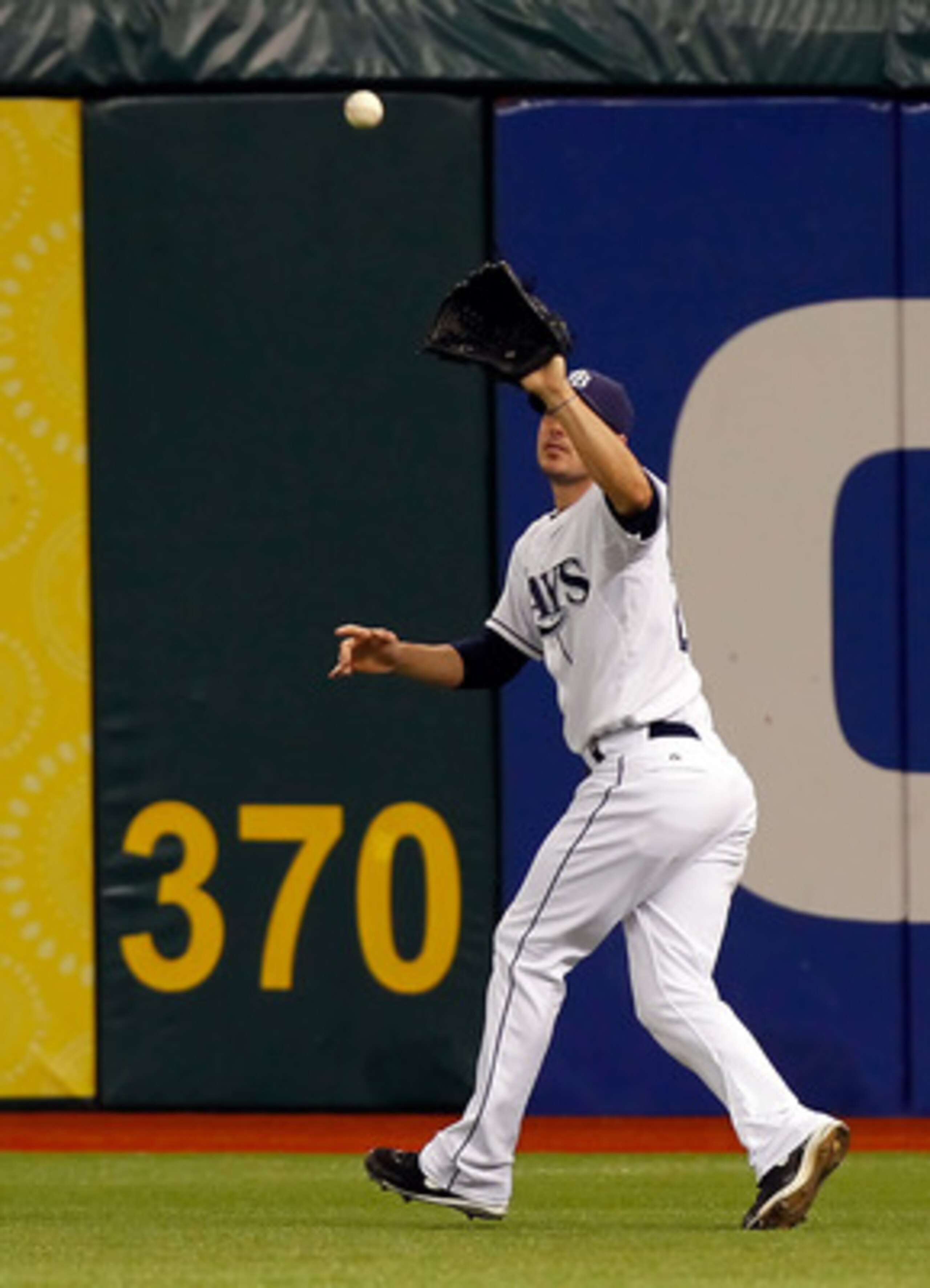 ST. PETERSBURG, FL - MAY 14: Outfielder Matt Joyce #20 of the Tampa Bay Rays catches a fly ball against the Baltimore Orioles during the game at Tropicana Field on May 14, 2011 in St. Petersburg, Florida. (Photo by J. Meric/Getty Images) ST. PETERSBURG, FL - MAY 14: Outfielder Matt Joyce #20 of the Tampa Bay Rays catches a fly ball against the Baltimore Orioles during the game at Tropicana Field on May 14, 2011 in St. Petersburg, Florida. (Photo by J. Meric/Getty Images)