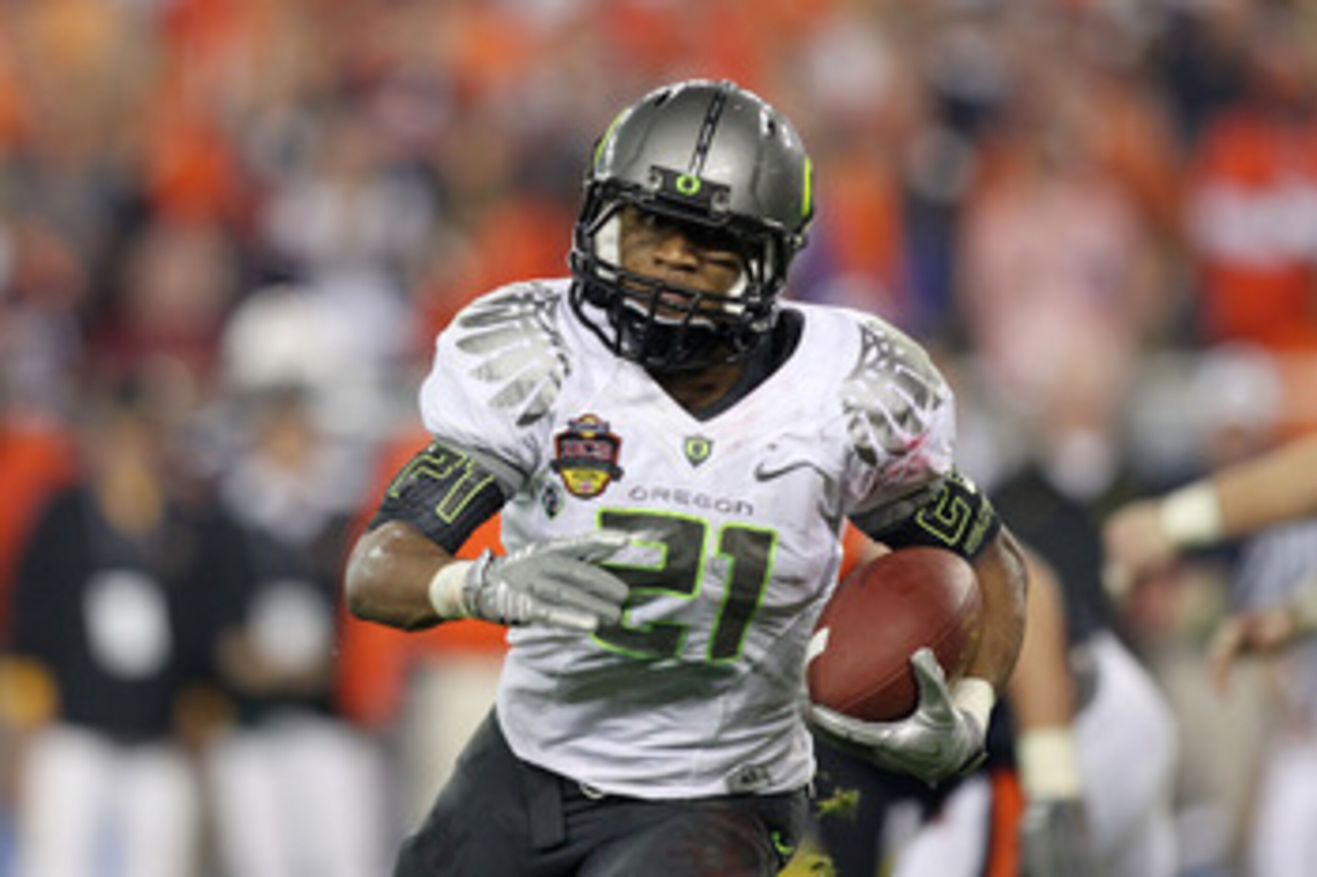 GLENDALE, AZ - JANUARY 10: LaMichael James #21 of the Oregon Ducks runs down field against the Auburn Tigers during the Tostitos BCS National Championship Game at University of Phoenix Stadium on January 10, 2011 in Glendale, Arizona. (Photo by Jonathan GLENDALE, AZ - JANUARY 10: LaMichael James #21 of the Oregon Ducks runs down field against the Auburn Tigers during the Tostitos BCS National Championship Game at University of Phoenix Stadium on January 10, 2011 in Glendale, Arizona. (Photo by Jonathan