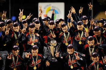 LOS ANGELES, CA - MARCH 23:  Japan players hold up the championship trophy after defeating Korea during the finals of the 2009 World Baseball Classic on March 23, 2009 at Dodger Stadium in Los Angeles, California. Japan won 5-3 in 10 innings.  (Photo by K