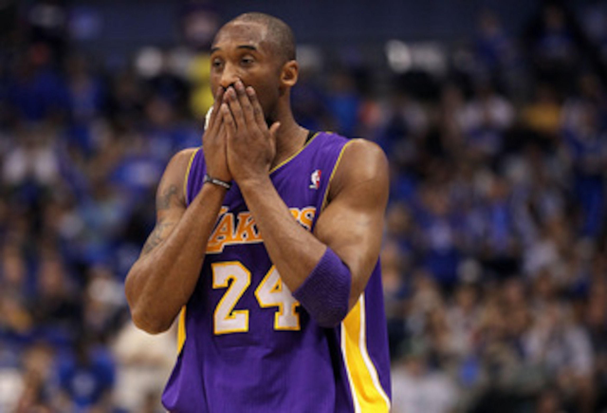 DALLAS, TX - MAY 08: Guard Kobe Bryant #24 of the Los Angeles Lakers wipes his face during play against the Dallas Mavericks in Game Four of the Western Conference Semifinals during the 2011 NBA Playoffs on May 8, 2011 at American Airlines Center in Dall DALLAS, TX - MAY 08: Guard Kobe Bryant #24 of the Los Angeles Lakers wipes his face during play against the Dallas Mavericks in Game Four of the Western Conference Semifinals during the 2011 NBA Playoffs on May 8, 2011 at American Airlines Center in Dall