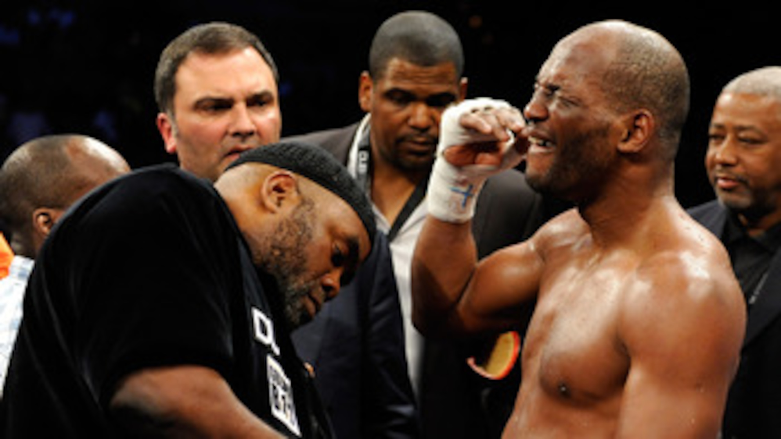 LAS VEGAS - APRIL 03:  Bernard Hopkins (R) reacts as his trainer Naazim Richardson takes his gloves off after Hopkins defeated Roy Jones Jr. in their light heavyweight bout by unanimous decision at the Mandalay Bay Events Center April 3, 2010 in Las Vegas