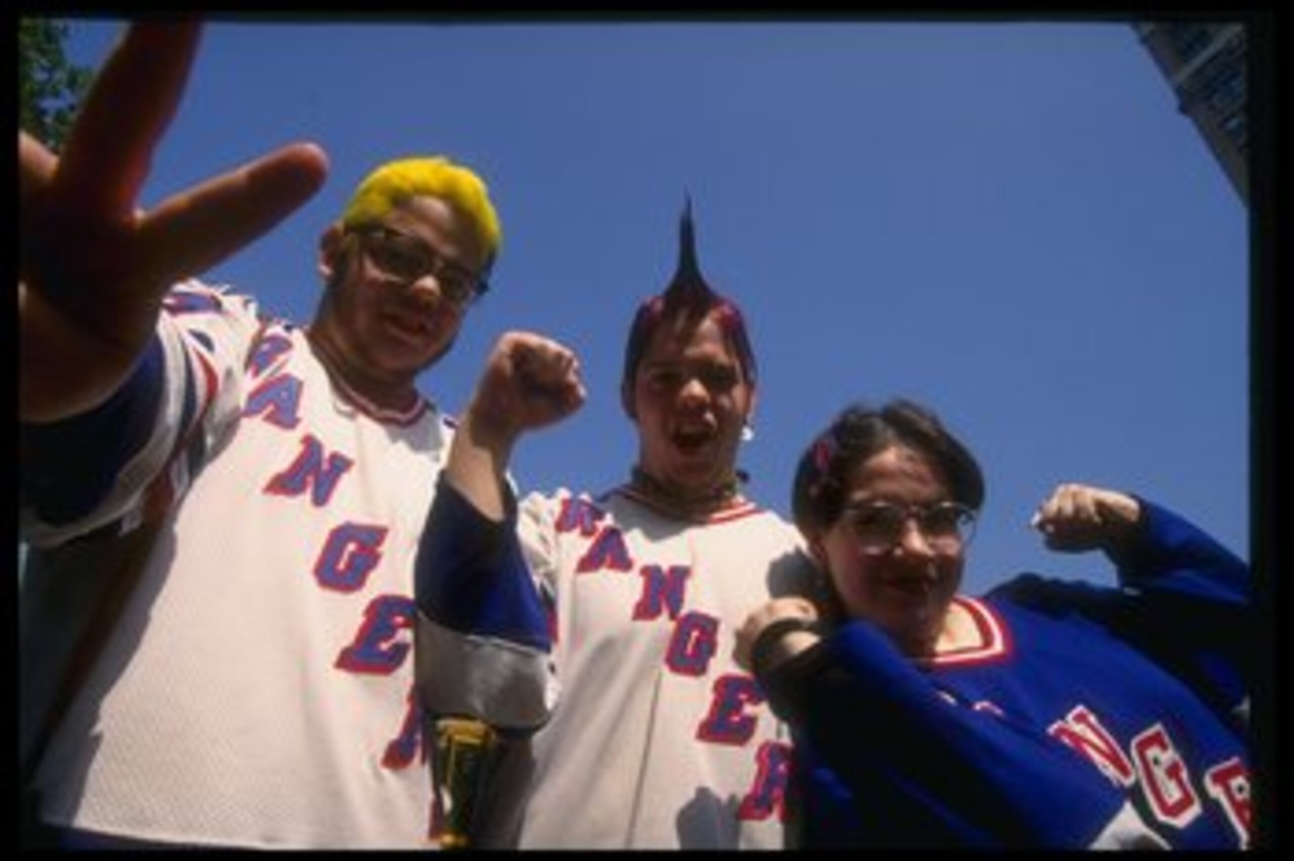 17 Jun 1994:  New York Rangers fans celebrate during a ticker tape parade in New York City, New York. Mandatory Credit: Al Bello  /Allsport