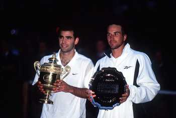 9 Jul 2000:  Pete Sampras of the USA and Patrick Rafter of Australia with their trophies after the final of the mens singles in the Wimbledon Lawn Tennis Championship at the All England Lawn Tennis and Croquet Club, Wimbledon, London. Mandatory Credit: Cl