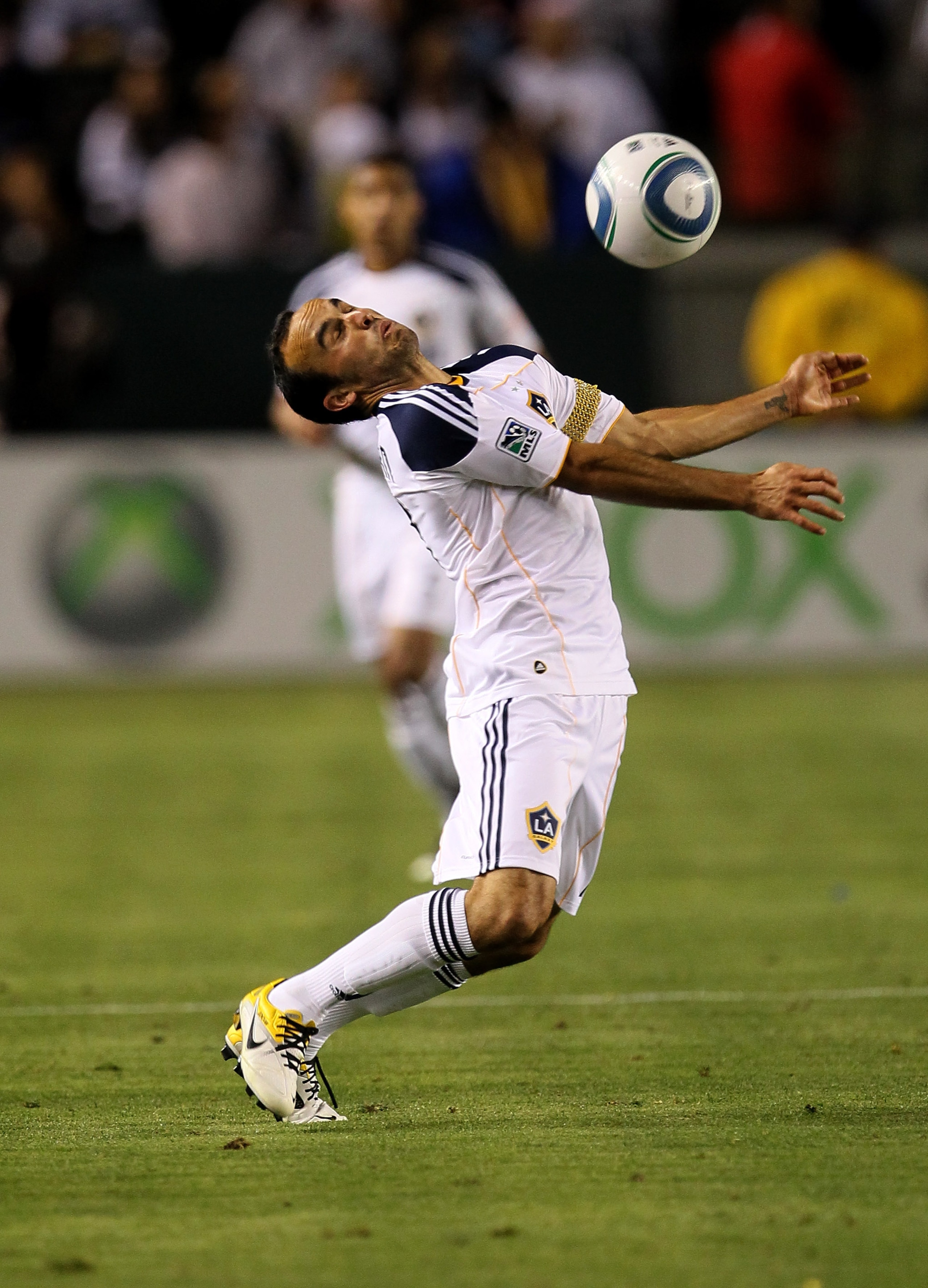 CARSON, CA - MAY 14:   Landon Donovan #10 of the Los Angeles Galaxy plays the ball off his chest against Sporting Kansas City at The Home Depot Center on May 14, 2011 in Carson, California.  The Galaxy won 4-1.  (Photo by Stephen Dunn/Getty Images)