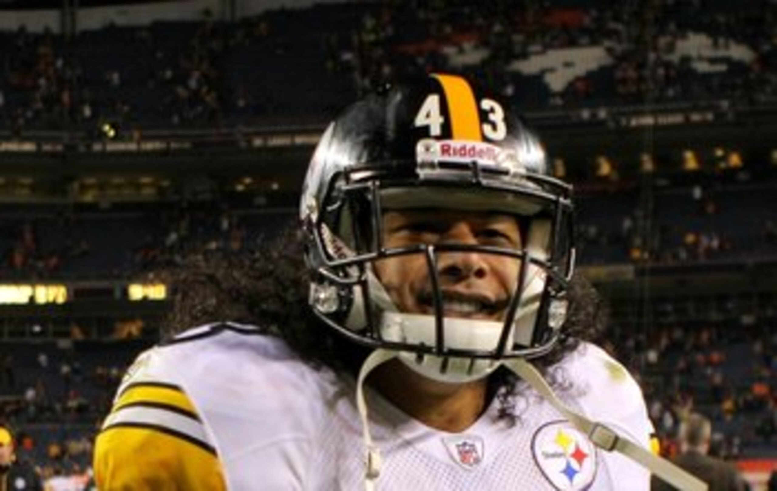 DENVER - NOVEMBER 09:  Troy Polamalu #43 of the Pittsburgh Steelers leaves the field after the game against the Denver Broncos on during NFL action at Invesco Field at Mile High on November 9, 2009 in Denver, Colorado. The Steelers defeated the Broncos 28