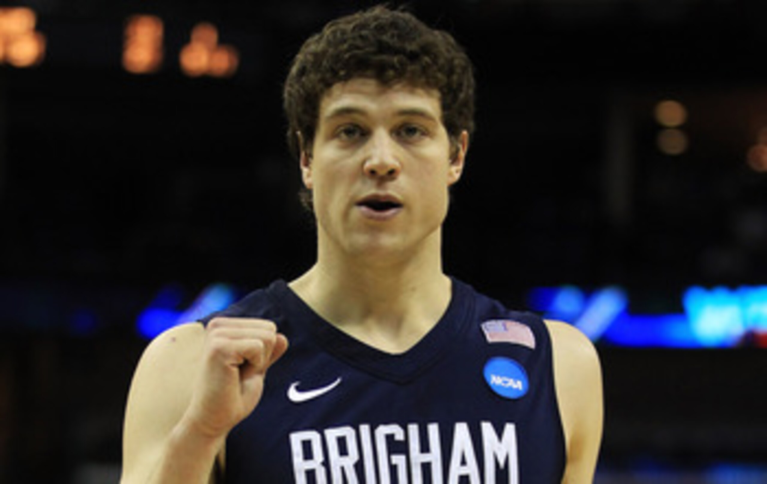 NEW ORLEANS, LA - MARCH 24:  Jimmer Fredette #32 of the Brigham Young Cougars celebrates against the Florida Gators during the Southeast regional of the 2011 NCAA men's basketball tournament at New Orleans Arena on March 24, 2011 in New Orleans, Louisiana