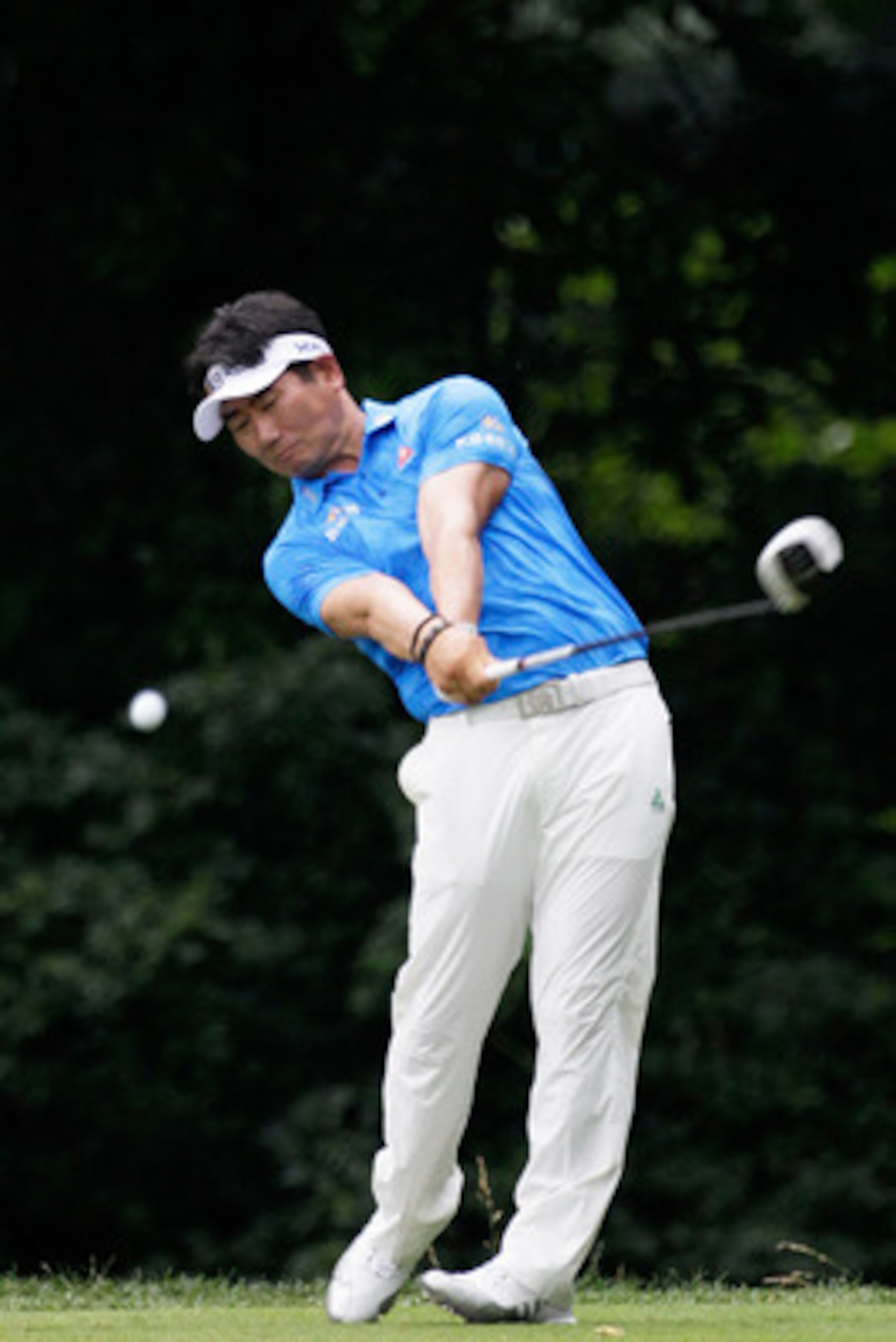 BETHESDA, MD - JUNE 18:  Y.E. Yang of South Korea hits his tee shot on the 14th hole during the third round of the 111th U.S. Open at Congressional Country Club on June 18, 2011 in Bethesda, Maryland.  (Photo by Rob Carr/Getty Images)
