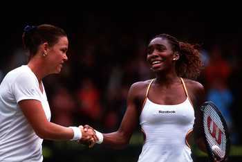 8 Jul 2000:  Venus Williams of the USA shakes hands with Lindsay Davenport of the USA after her victory in the final of the women's singles in the Wimbledon Lawn Tennis Championship at the All England Lawn Tennis and Croquet Club, Wimbledon, London. Manda