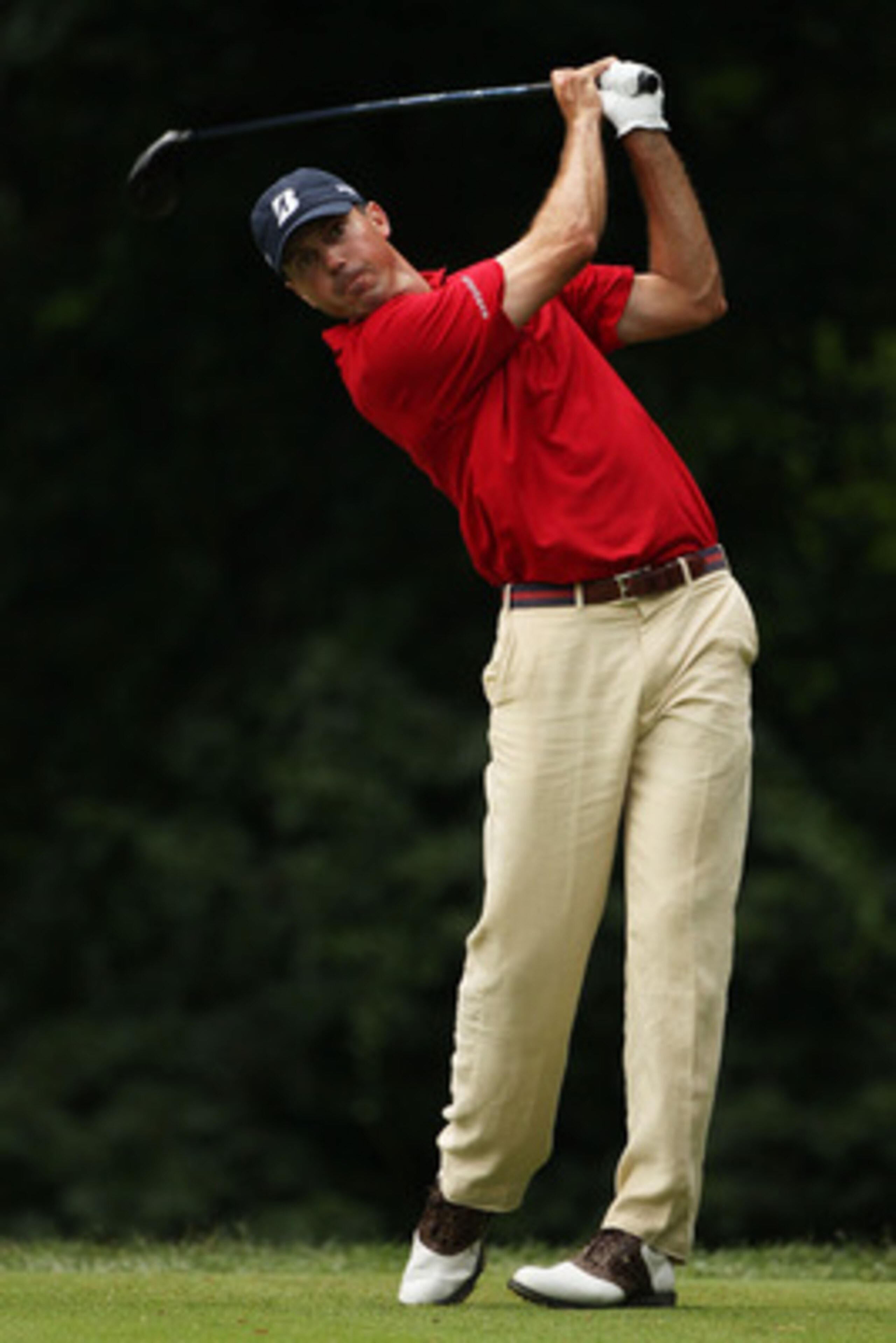 BETHESDA, MD - JUNE 18:  Matt Kuchar hits his tee shot on the 14th hole during the third round of the 111th U.S. Open at Congressional Country Club on June 18, 2011 in Bethesda, Maryland.  (Photo by Andrew Redington/Getty Images)