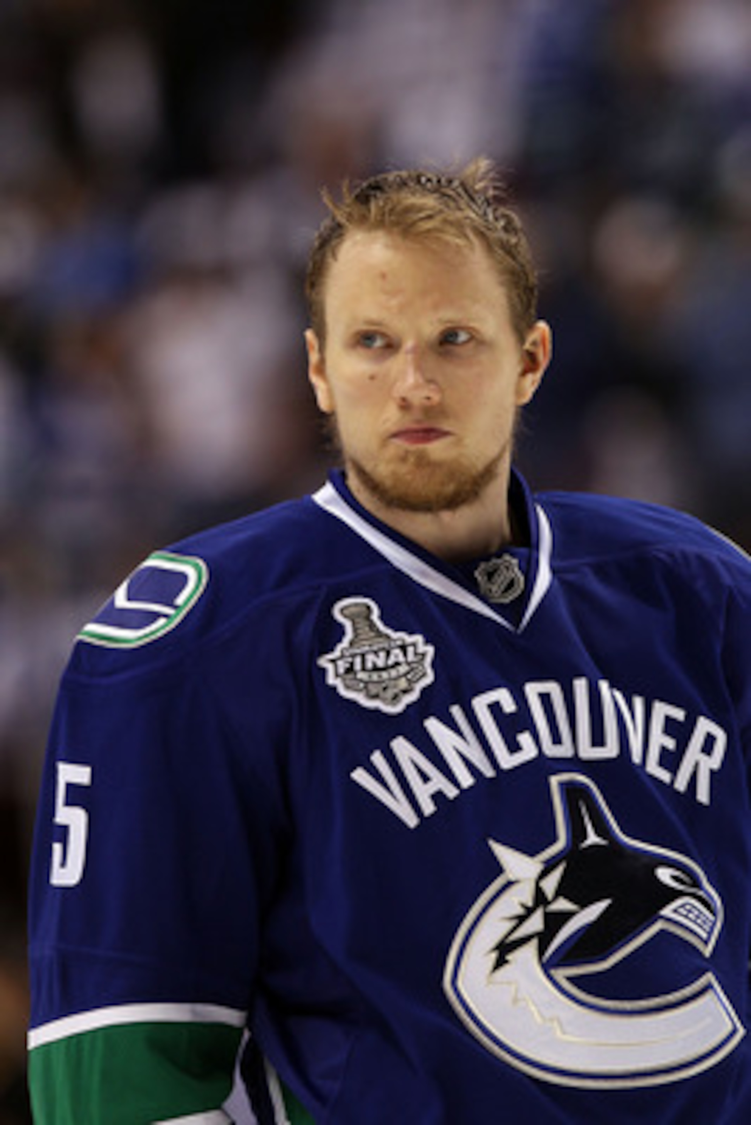 VANCOUVER, BC - JUNE 10:  Christian Ehrhoff #5 of the Vancouver Canucks looks on during Game Five of the 2011 NHL Stanley Cup Final at Rogers Arena on June 10, 2011 in Vancouver, British Columbia, Canada.  (Photo by Bruce Bennett/Getty Images)