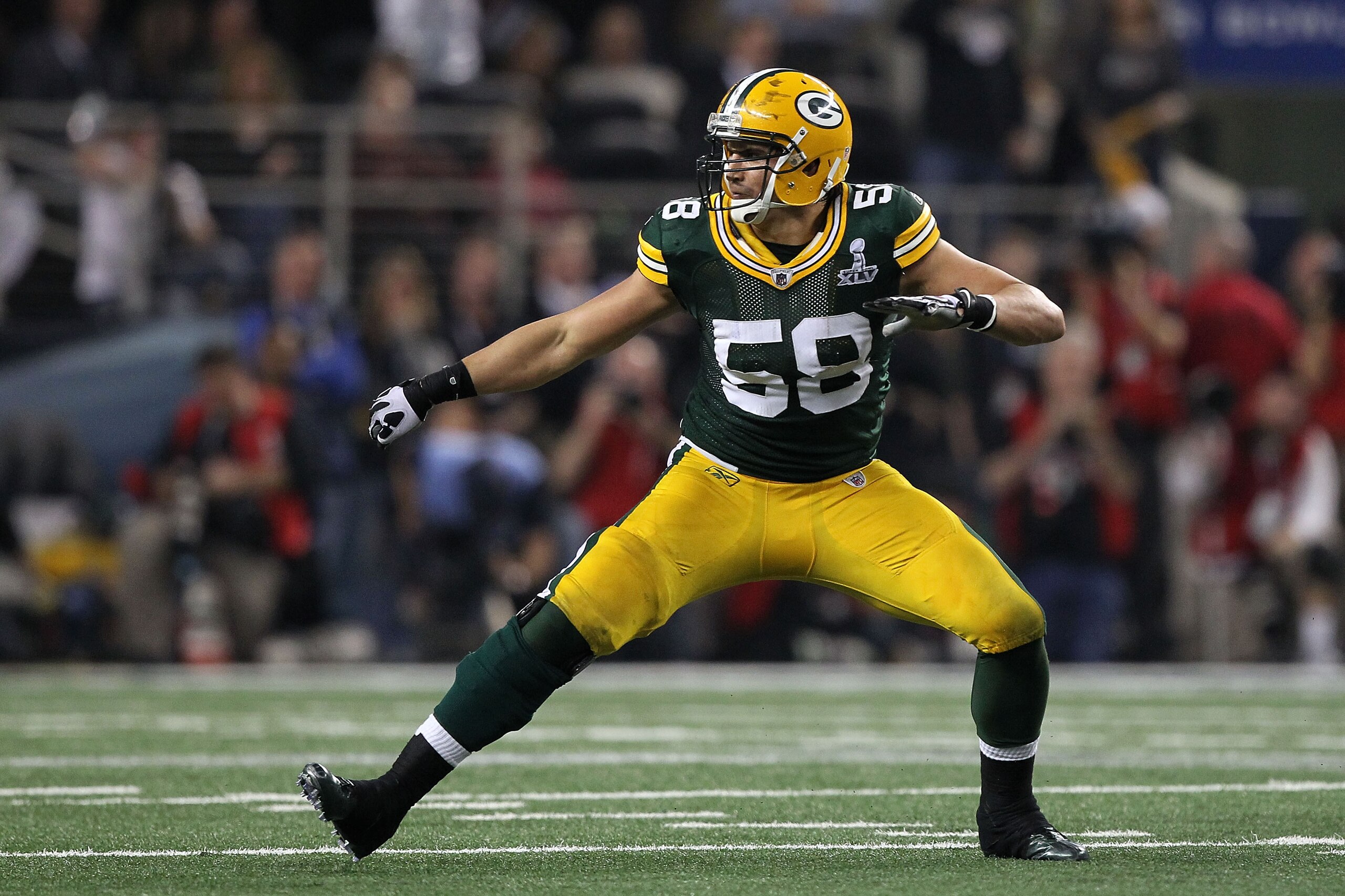 ARLINGTON, TX - FEBRUARY 06: Frank Zombo #58 of the Green Bay Packers celebrates after sacking Ben Roethlisberger #7 of the Pittsburgh Steelers during Super Bowl XLV at Cowboys Stadium on February 6, 2011 in Arlington, Texas.  (Photo by Al Bello/Getty Ima