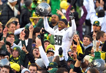 CORVALLIS, OR - DECEMBER 4: Cornerback Scott Grady #28 of the Oregon Ducks celebrates on the field after the game at Reser Stadium on December 4, 2010 in Corvallis, Oregon. he Ducks beat the Beavers 37-20 to likely go on the BCS Championship game at the T