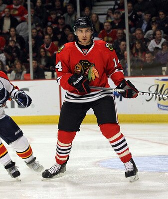 CHICAGO, IL - MARCH 23:  Chris Campoli #14 of the Chicago Blackhawks skates against the Florida Panthers at the United Center on March 23, 2011 in Chicago, Illinois. The Blackhawks defeated the Panthers 4-0.  (Photo by Bruce Bennett/Getty Images)