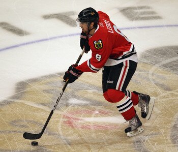 CHICAGO, IL - APRIL 17: Nick Leddy #8 of the Chicago Blackhawks skates up the ice against the Vancouver Canucks in Game Three of the Western Conference Quarterfinals during the 2011 NHL Stanley Cup Playoffs at the United Center on April 17, 2011 in Chicag