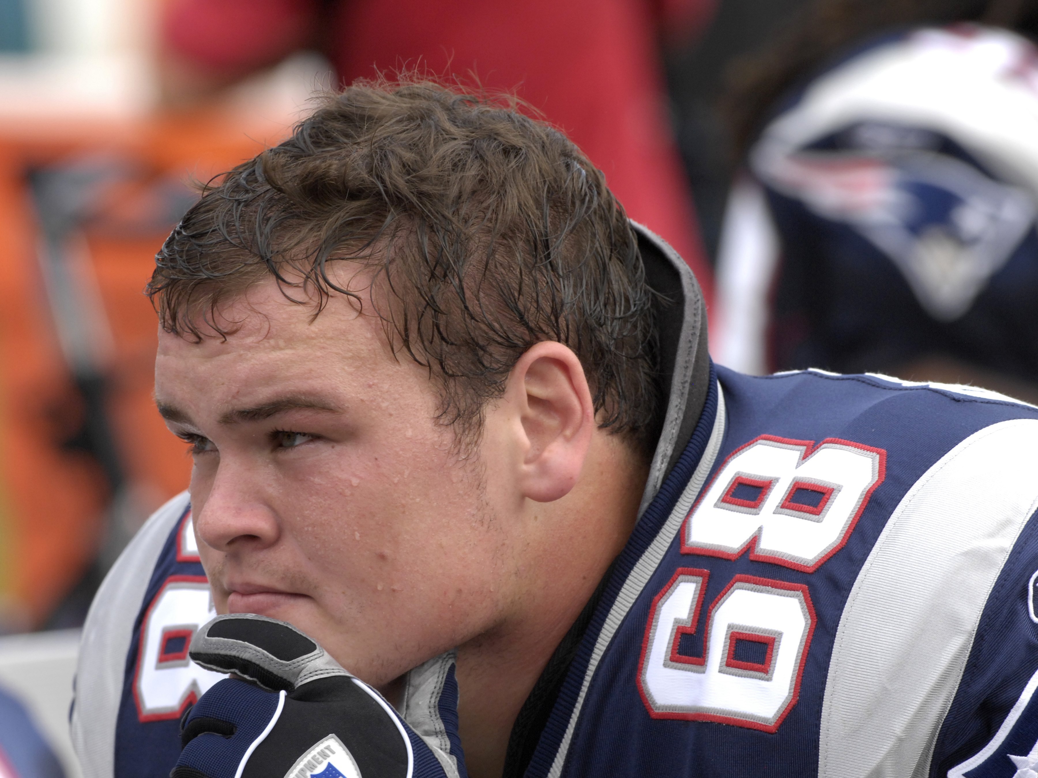 MIAMI, FL - OCTOBER 21: Tackle Ryan O'Callaghan #68 of the New England Patriots watches play against the Miami Dolphins at Dolphin Stadium on October 21, 2007 in Miami, Florida.  The Pats won 49 - 28. (Photo by Al Messerschmidt/Getty Images)