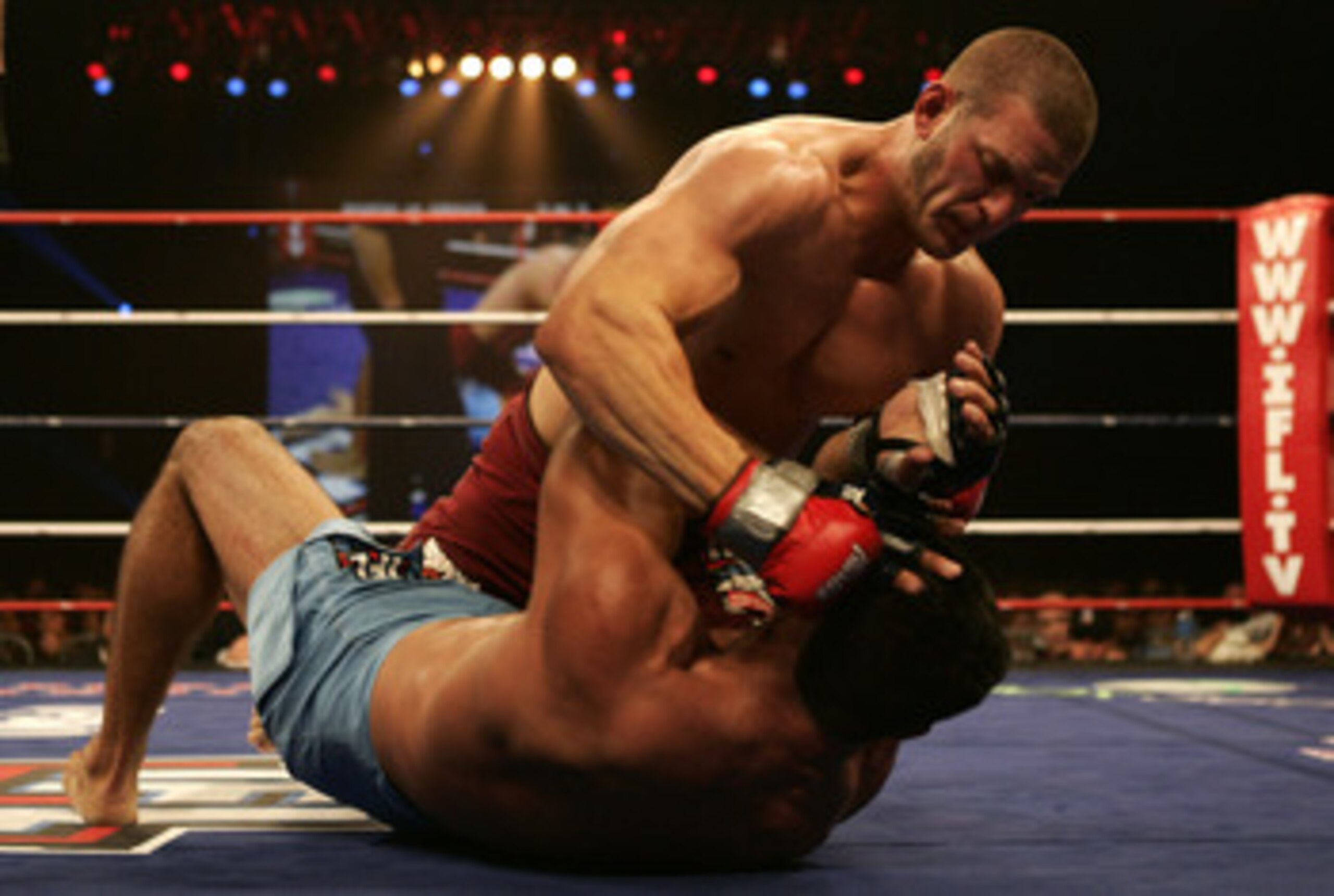 HOUSTON, TX - FEBRUARY 02:  John Marsh (blue shorts), heavyweight for the Sabres, fights against Chad Griggs of the Scorpions at the International Fight League event at the Reliant Arena on February 2, 2007 in Houston, Texas.  (Photo by Robert Laberge/Get