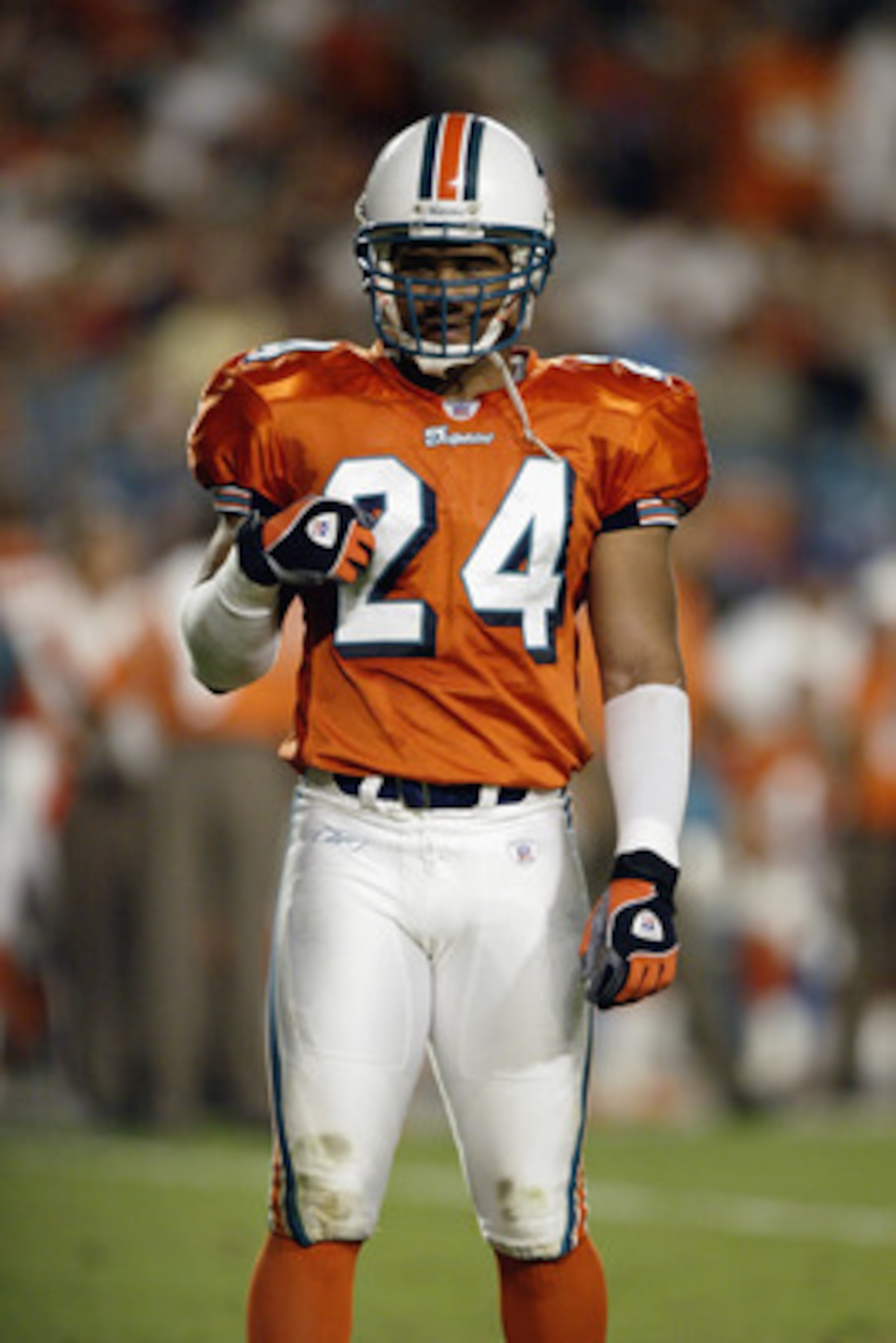 MIAMI - NOVEMBER 23:  Safety Sammy Knight #24 of the Miami Dolphins looks on during the game against the Washington Redskins on November 23, 2003 at Pro Player Stadium in Miami, Florida. The Dolphins defeated the Redskins 24-23. (Photo by Matthew Stockman