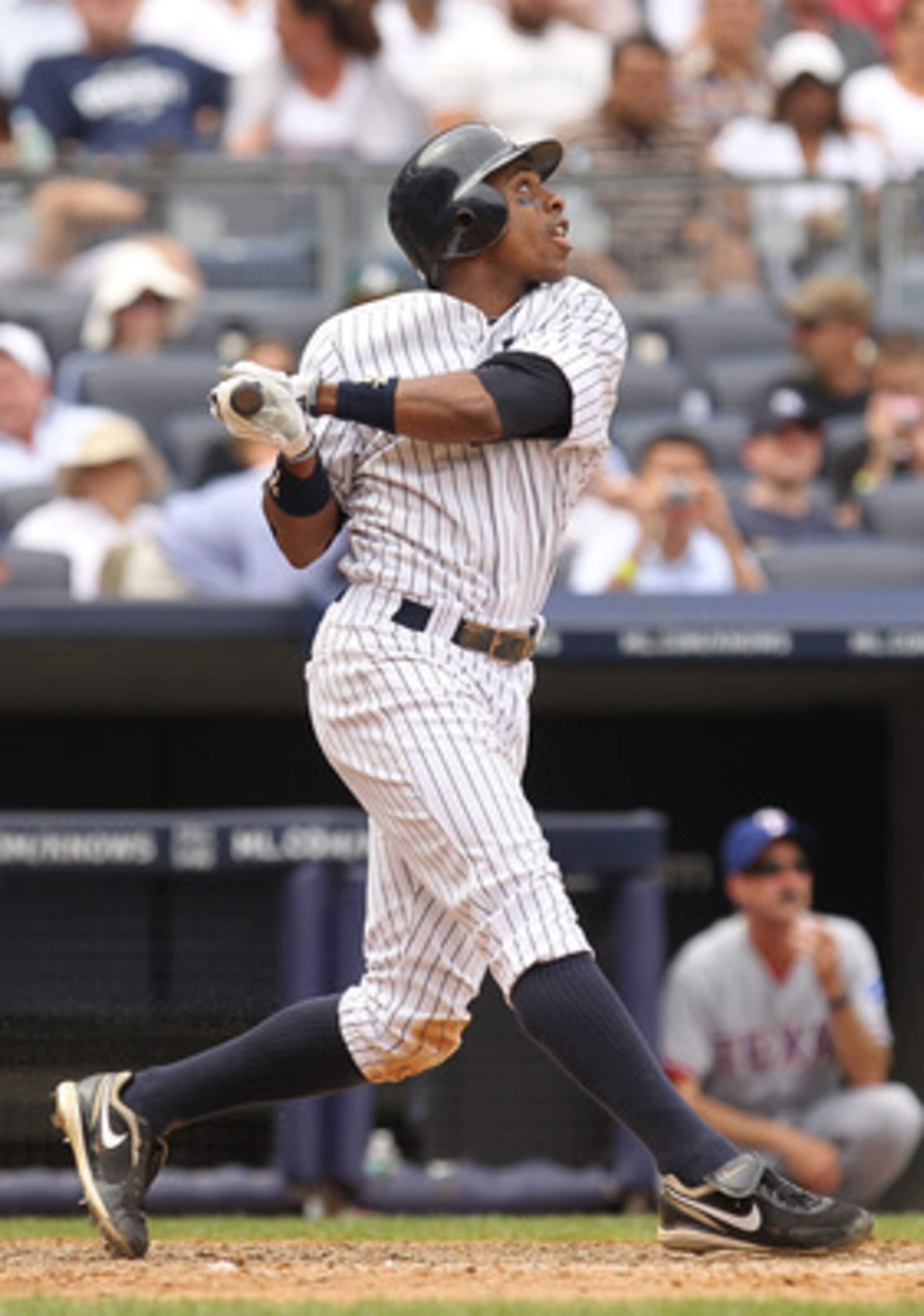 NEW YORK, NY - JUNE 16: Curtis Granderson #14 of the New York Yankees in action against the Texas Rangers during their game on June 16, 2011 at Yankee Stadium in the Bronx borough of New York City. (Photo by Al Bello/Getty Images) NEW YORK, NY - JUNE 16: Curtis Granderson #14 of the New York Yankees in action against the Texas Rangers during their game on June 16, 2011 at Yankee Stadium in the Bronx borough of New York City. (Photo by Al Bello/Getty Images)