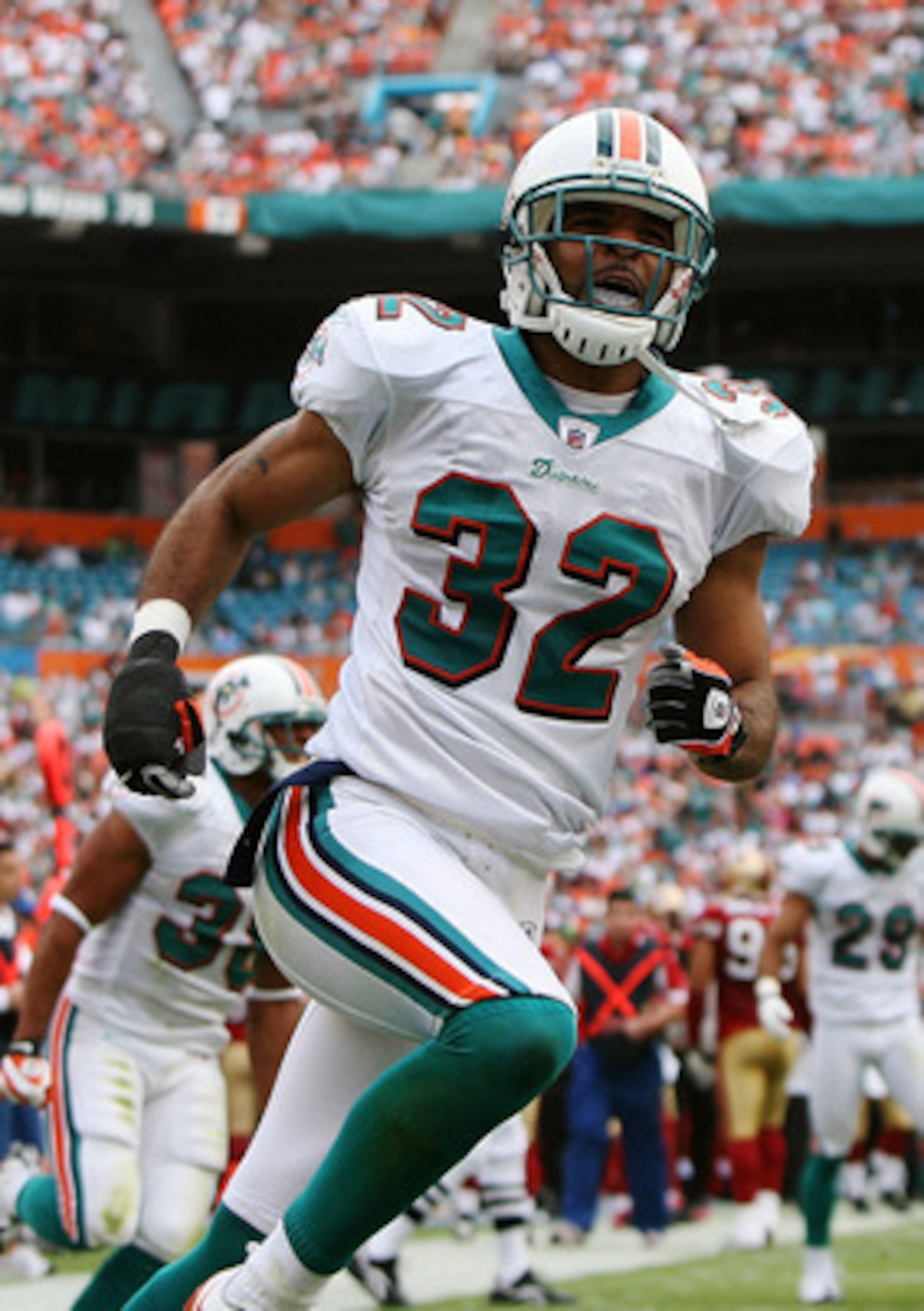 MIAMI - DECEMBER 14:  Cornerback Jason Allen #32 of the Miami Dolphins celebrates after making a big play against the San Francisco 49ers at Dolphin Stadium on December 14, 2008 in Miami, Florida.  (Photo by Doug Benc/Getty Images)