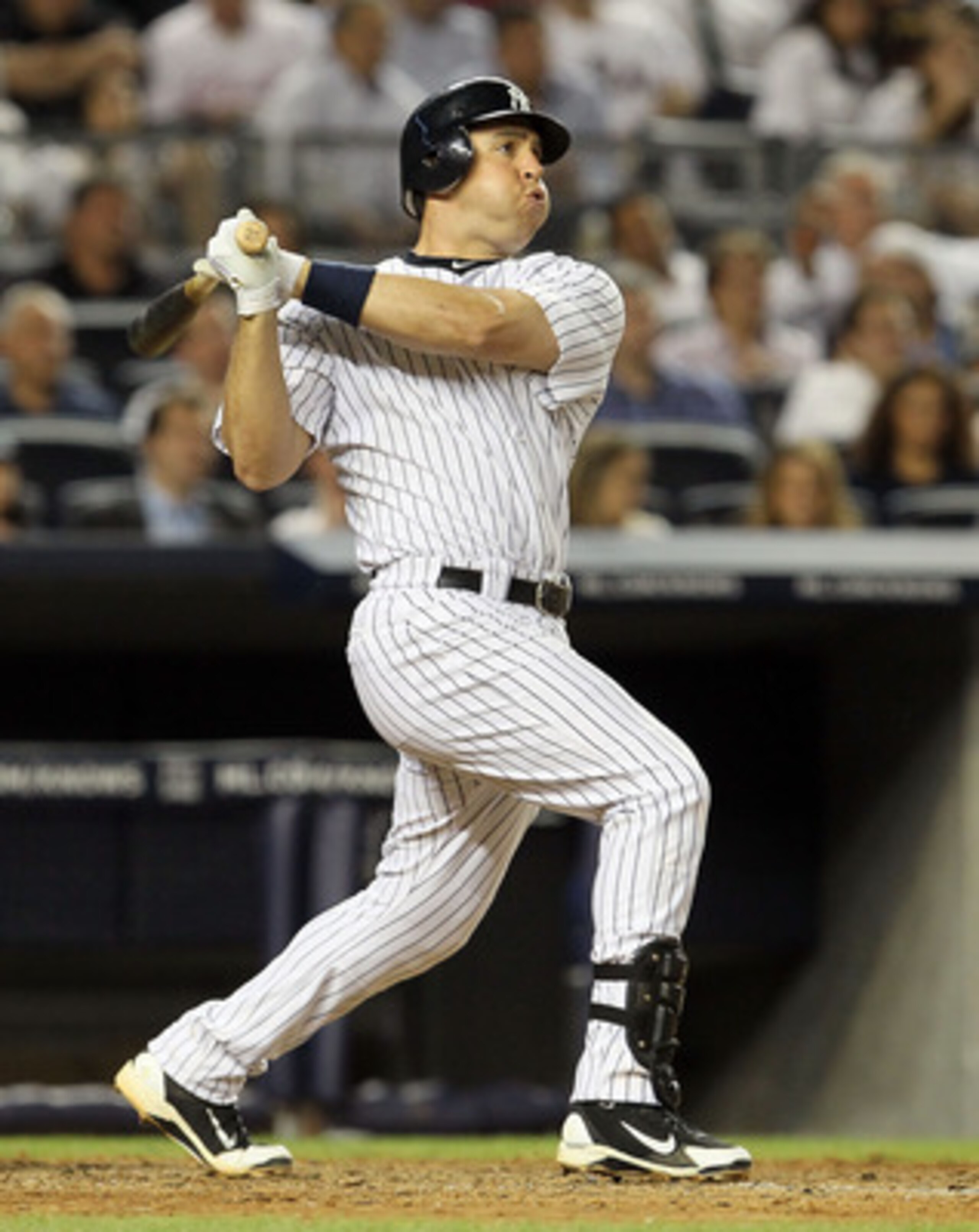 NEW YORK, NY - JUNE 15: Mark Teixeira #25 of the New York Yankees follows through on a sixth inning two run home run against the Texas Rangers on June 15, 2011 at Yankee Stadium in the Bronx borough of New York City. (Photo by Jim McIsaac/Getty Images) NEW YORK, NY - JUNE 15: Mark Teixeira #25 of the New York Yankees follows through on a sixth inning two run home run against the Texas Rangers on June 15, 2011 at Yankee Stadium in the Bronx borough of New York City. (Photo by Jim McIsaac/Getty Images)