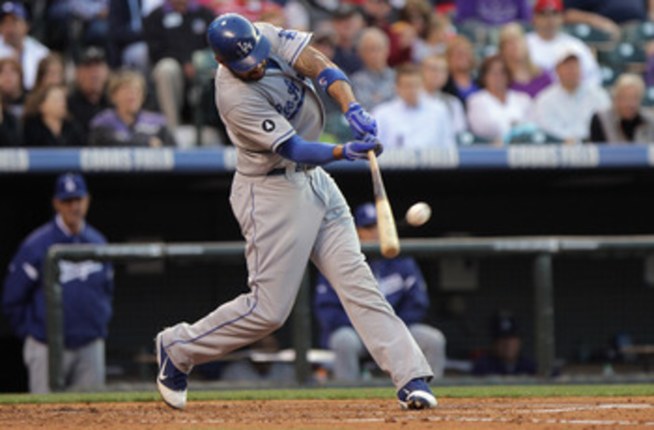 DENVER, CO - JUNE 09: Matt Kemp #27 of the Los Angeles Dodgers hits a solo homerun off of starting pitcher Juan Nicasio of the Colorado Rockies to deep center field to give the Dodger a 1-0 lead in the second inning at Coors Field on June 9, 2011 in Denv DENVER, CO - JUNE 09: Matt Kemp #27 of the Los Angeles Dodgers hits a solo homerun off of starting pitcher Juan Nicasio of the Colorado Rockies to deep center field to give the Dodger a 1-0 lead in the second inning at Coors Field on June 9, 2011 in Denv