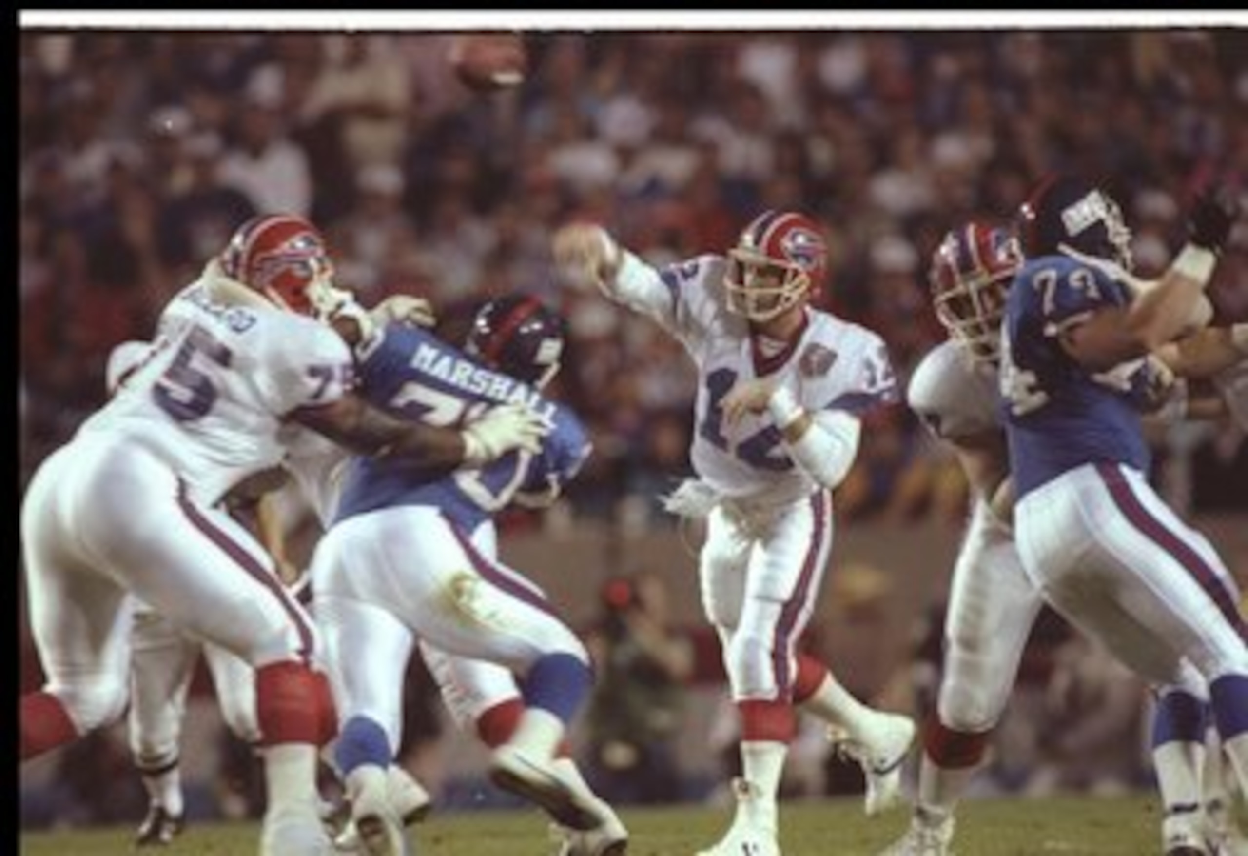 12 Jan 1991: Quarterback Jim Kelly #12 of the Buffalo Bills throws the ball against the New York Giants during Super Bowl XXV at Tampa Stadium in Tampa, Florida. The Giants won the game, 20-19.