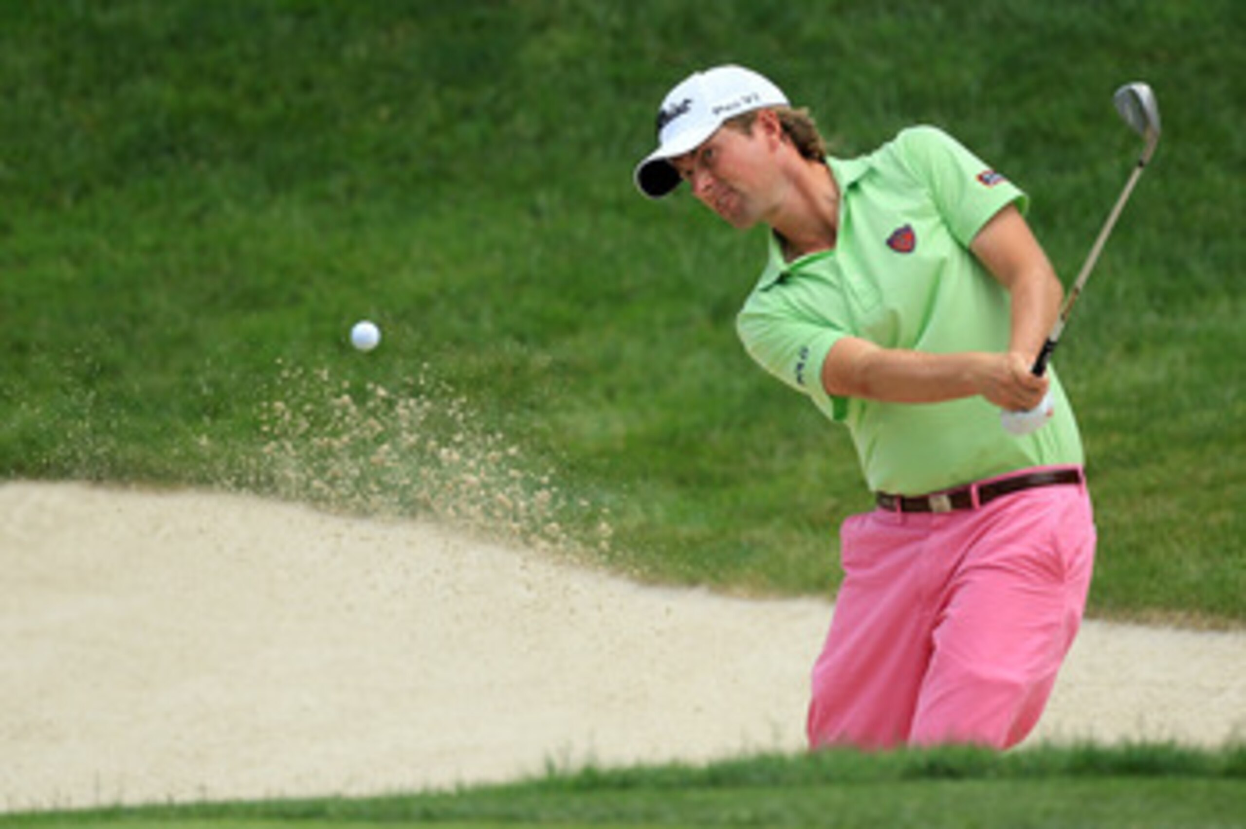 BETHESDA, MD - JUNE 16:  Webb Simpson hits his third shot on the fifth hole from a bunker during the first round of the 111th U.S. Open at Congressional Country Club on June 16, 2011 in Bethesda, Maryland.  (Photo by David Cannon/Getty Images)