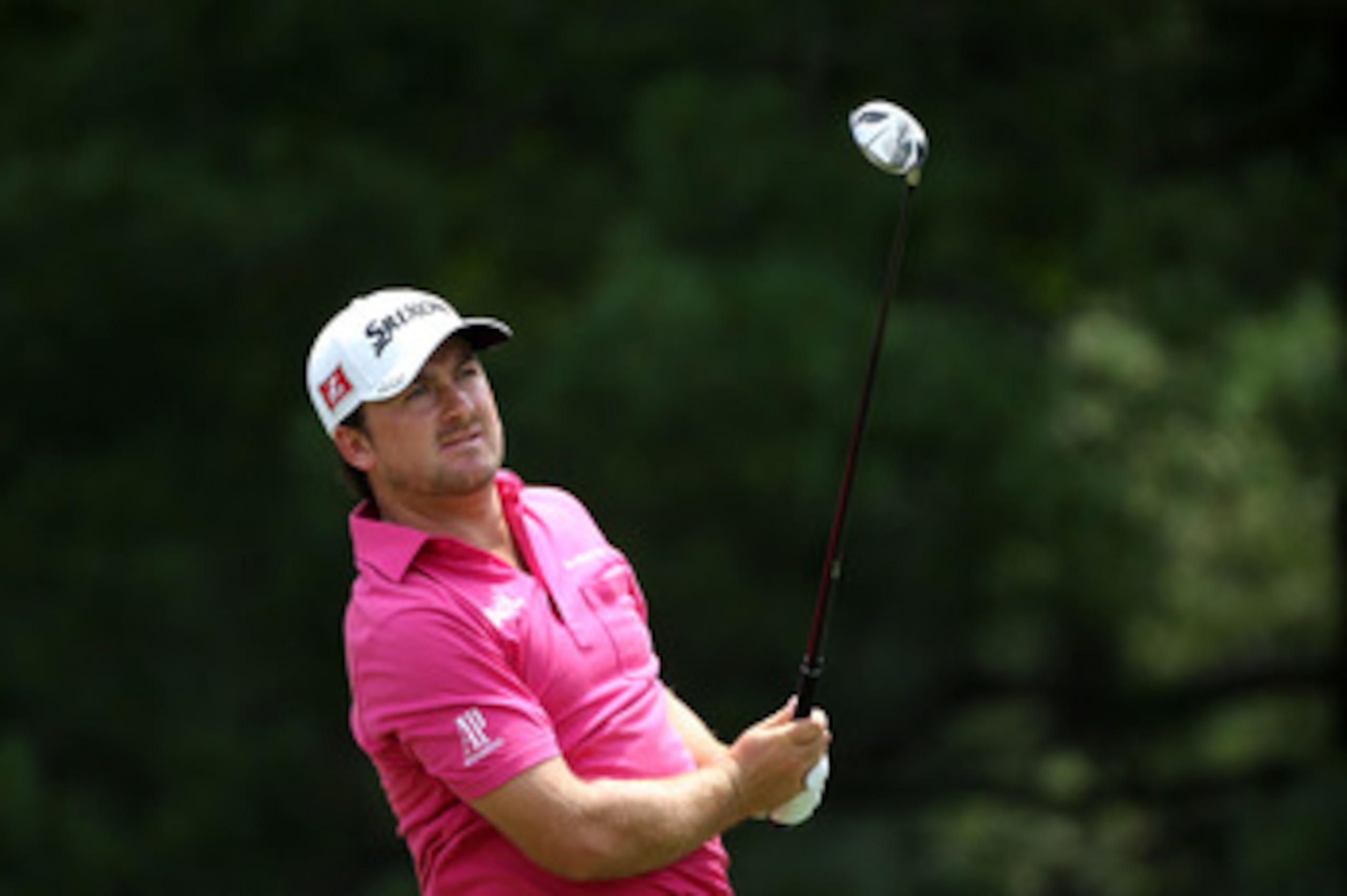 BETHESDA, MD - JUNE 18:  Graeme McDowell of Northern Ireland watches his tee shot on the second hole during the third round of the 111th U.S. Open at Congressional Country Club on June 18, 2011 in Bethesda, Maryland.  (Photo by Andrew Redington/Getty Imag