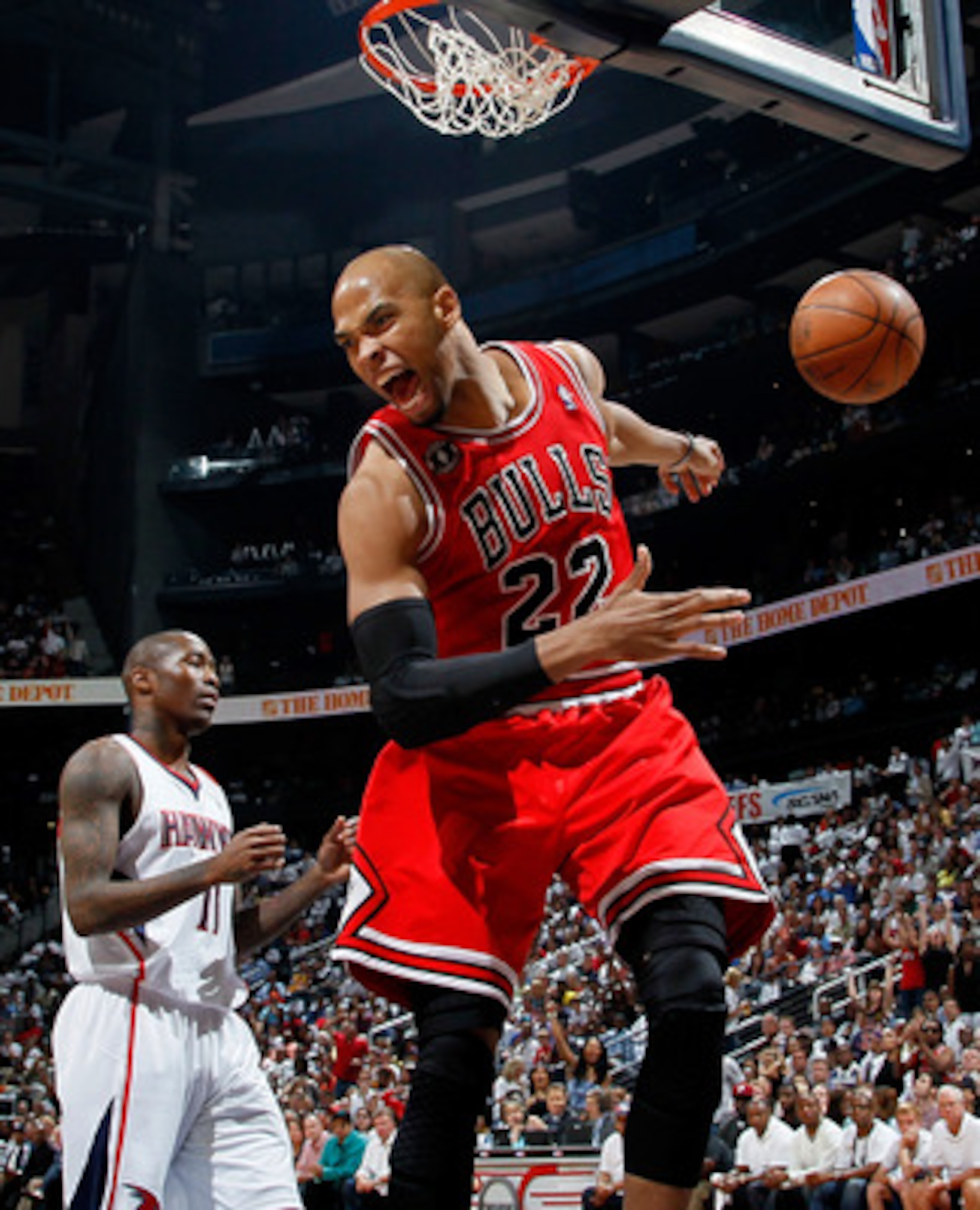 ATLANTA, GA - MAY 08:  Taj Gibson #22 of the Chicago Bulls reacts after dunking off a steal from Jamal Crawford #11 of the Atlanta Hawks in Game Four of the Eastern Conference Semifinals in the 2011 NBA Playoffs at Phillips Arena on May 8, 2011 in Atlanta