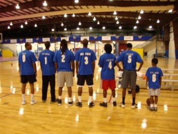 My dad preparing to play basketball with his sons.