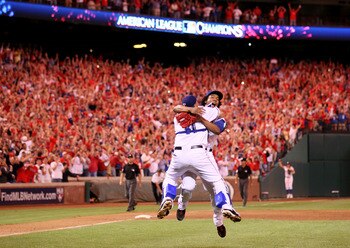 ARLINGTON, TX - OCTOBER 22:  Bengie Molina #11 and Neftali Feliz #30 of the Texas Rangers celebrate after defeating the New York Yankees 6-1 in Game Six of the ALCS to advance to the World Series during the 2010 MLB Playoffs at Rangers Ballpark in Arlingt