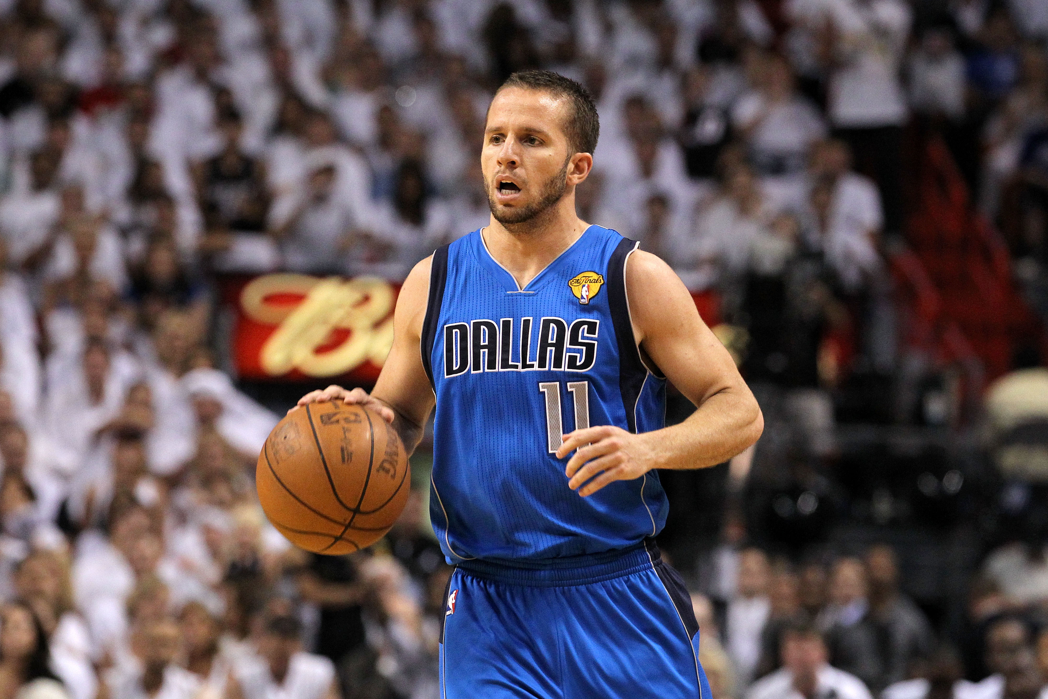 MIAMI, FL - JUNE 12:  Jose Juan Barea #11 of the Dallas Mavericks brings the ball up court against the Miami Heat in Game Six of the 2011 NBA Finals at American Airlines Arena on June 12, 2011 in Miami, Florida. The Mavericks won 105-95. NOTE TO USER: Use