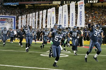 PHILADELPHIA - DECEMBER 2:  Shaun Alexander #37 of the Seattle Seahawks carries the ball during the NFL game against the Philadelphia Eagles at the Lincoln Financial Field on December 2, 2007 in Philadelphia, Pennsylvania. (Photo by Al Bello/Getty Images)