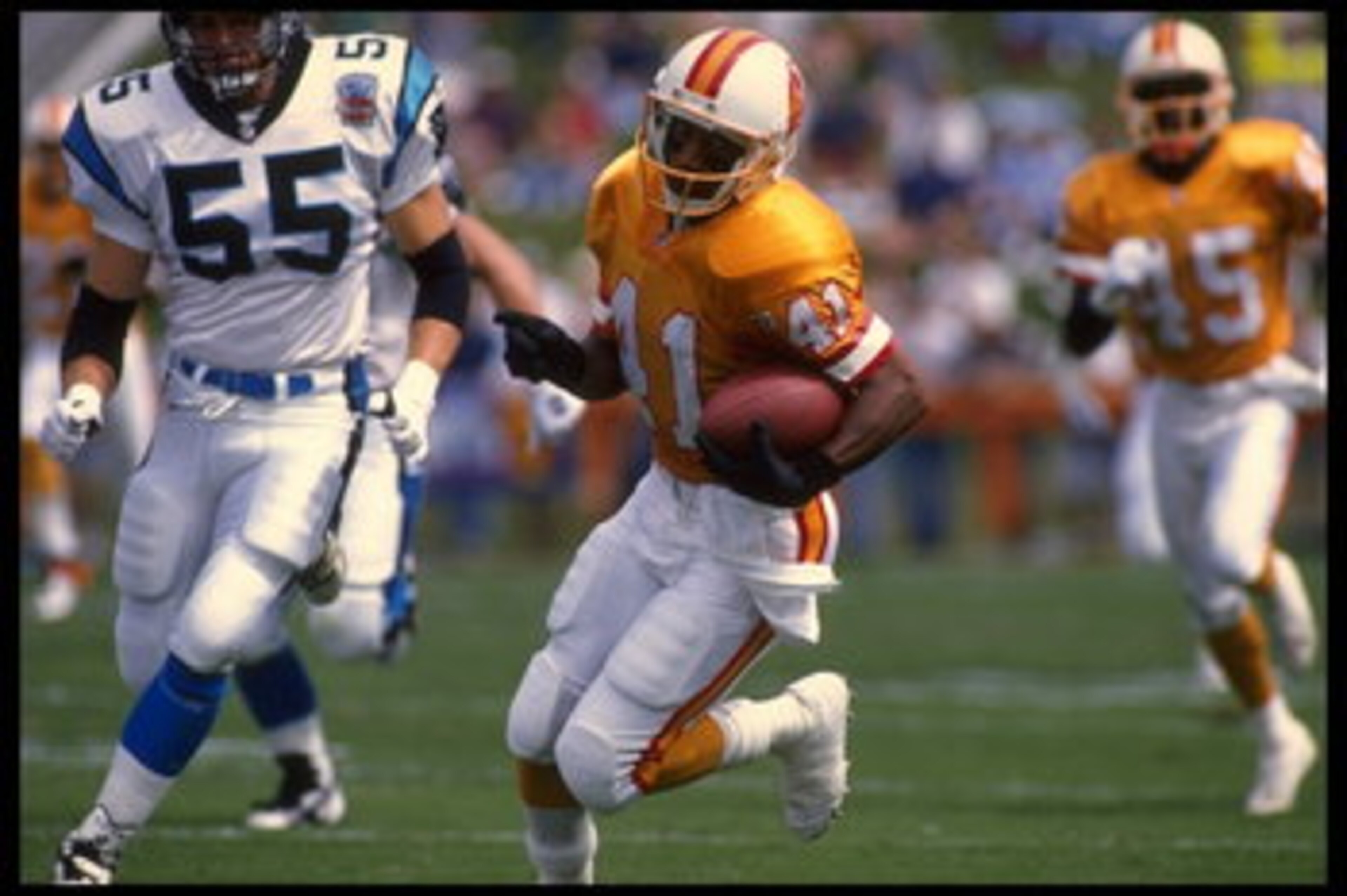 Bobby Joe Edmonds #41 of the of the Tampa Bay Buccaneers looks up field as he runs with the ball during a carry in the Buccaneers 20-13 victory over the Carolina Panthers at Memorial Stadium in Clemson, South Carolina.