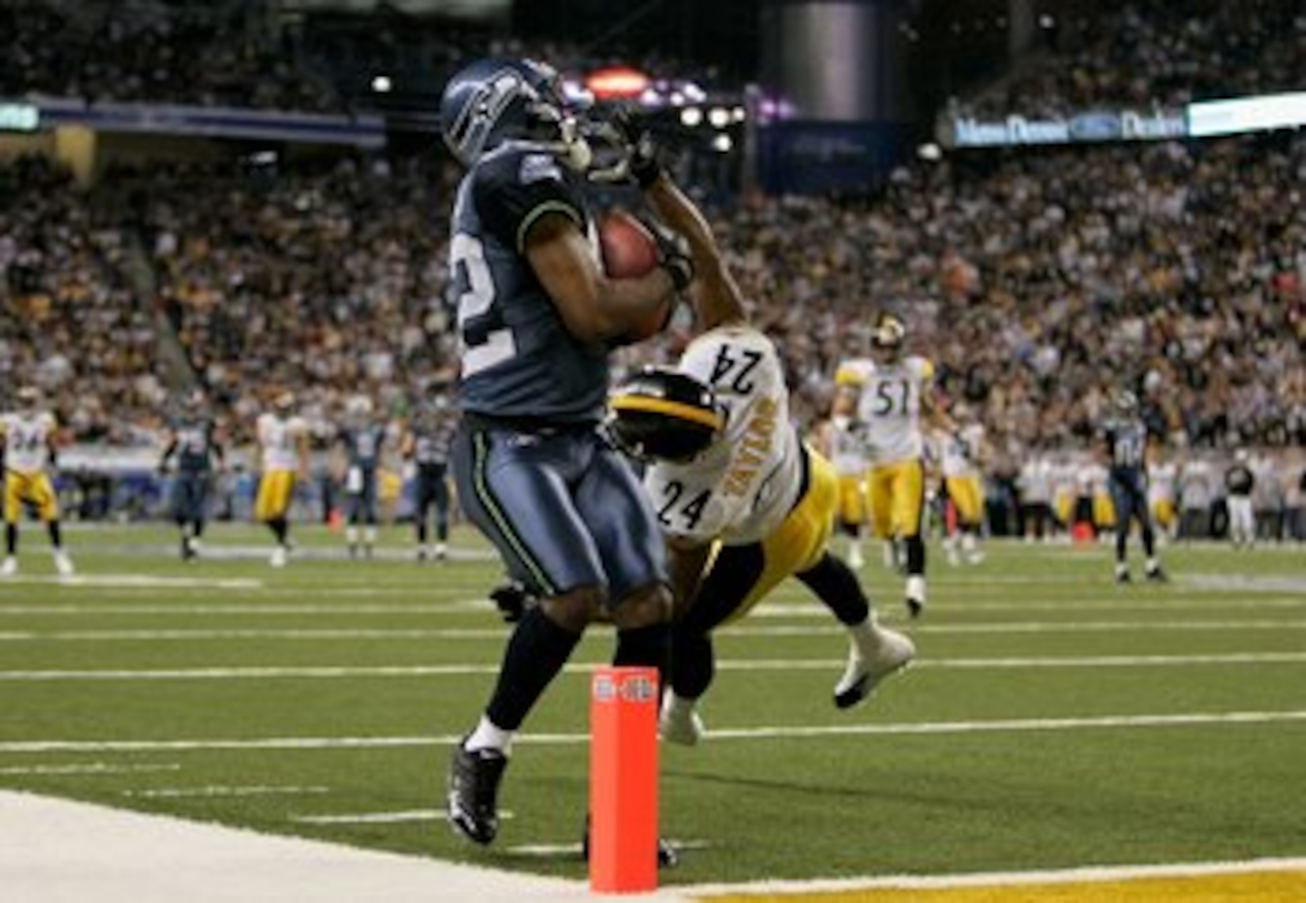 DETROIT - FEBRUARY 5: Darrell Jackson #82 of the Seattle Seahawks is ruled out of bounds for an incomplete pass against Ike Taylor #24 of the Pittsburgh Steelers on a 3rd and 6 yard play with 13 seconds left in the second quarter in Super Bowl XL at Ford DETROIT - FEBRUARY 5: Darrell Jackson #82 of the Seattle Seahawks is ruled out of bounds for an incomplete pass against Ike Taylor #24 of the Pittsburgh Steelers on a 3rd and 6 yard play with 13 seconds left in the second quarter in Super Bowl XL at Ford