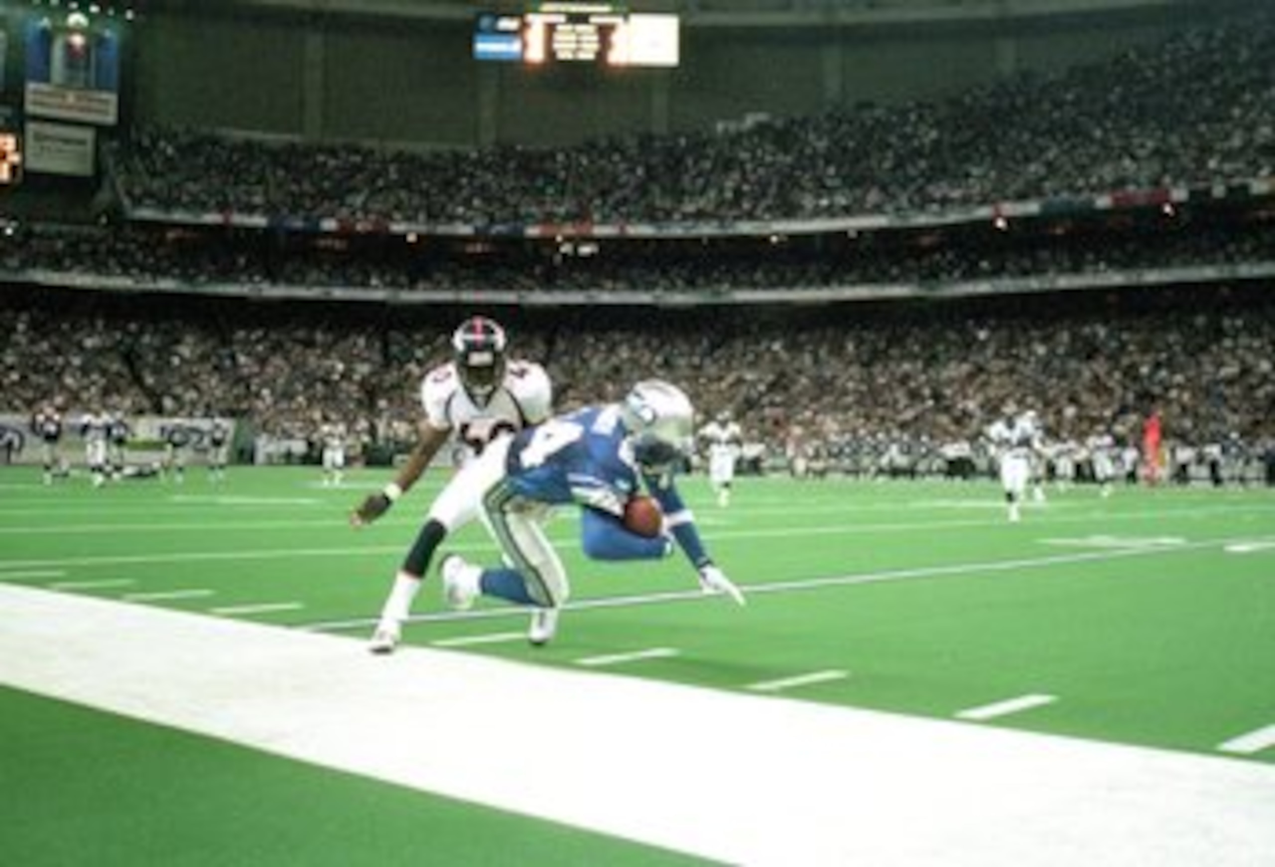 14 Nov 1999: Joey Galloway #84 of the Seattle Seahawks carries the ball as he is pushed out of bounds during the game against the Denver Broncos at The Kingdome in Seattle, Washington. The Seahawks defeated the Broncos 20-17. Mandatory Credit: Otto Gre 14 Nov 1999: Joey Galloway #84 of the Seattle Seahawks carries the ball as he is pushed out of bounds during the game against the Denver Broncos at The Kingdome in Seattle, Washington. The Seahawks defeated the Broncos 20-17. Mandatory Credit: Otto Gre