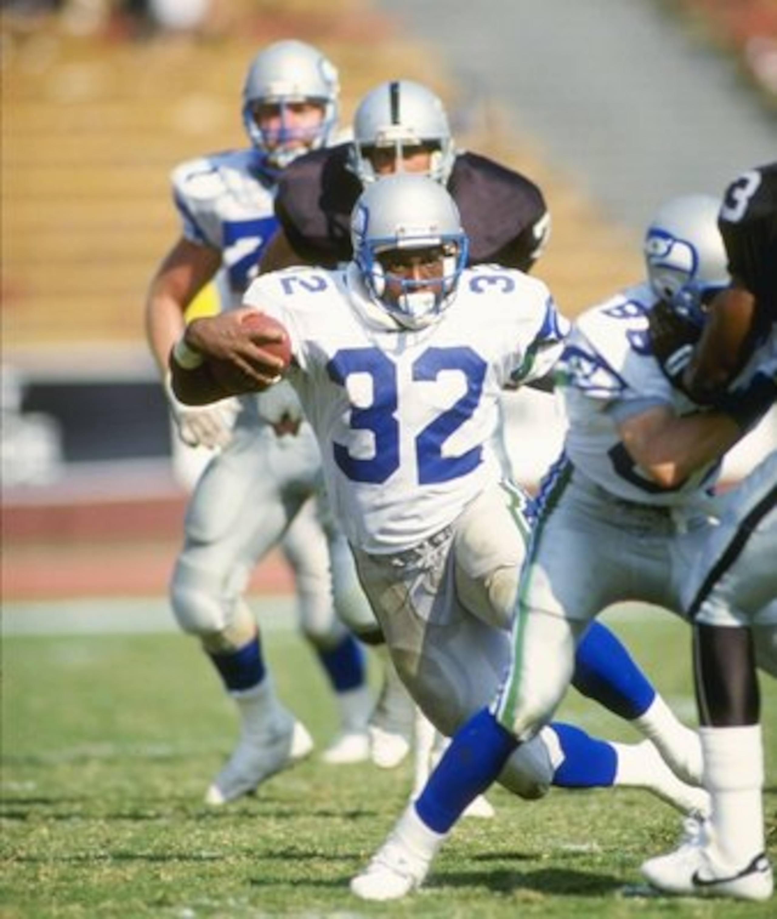 14 Oct 1990: Running back John L. Williams of the Seattle Seahawks moves the ball during a game against the Los Angeles Raiders at the Los Angeles Memorial Coliseum in Los Angeles, California. The Raiders won the game, 24-17. 14 Oct 1990: Running back John L. Williams of the Seattle Seahawks moves the ball during a game against the Los Angeles Raiders at the Los Angeles Memorial Coliseum in Los Angeles, California. The Raiders won the game, 24-17.