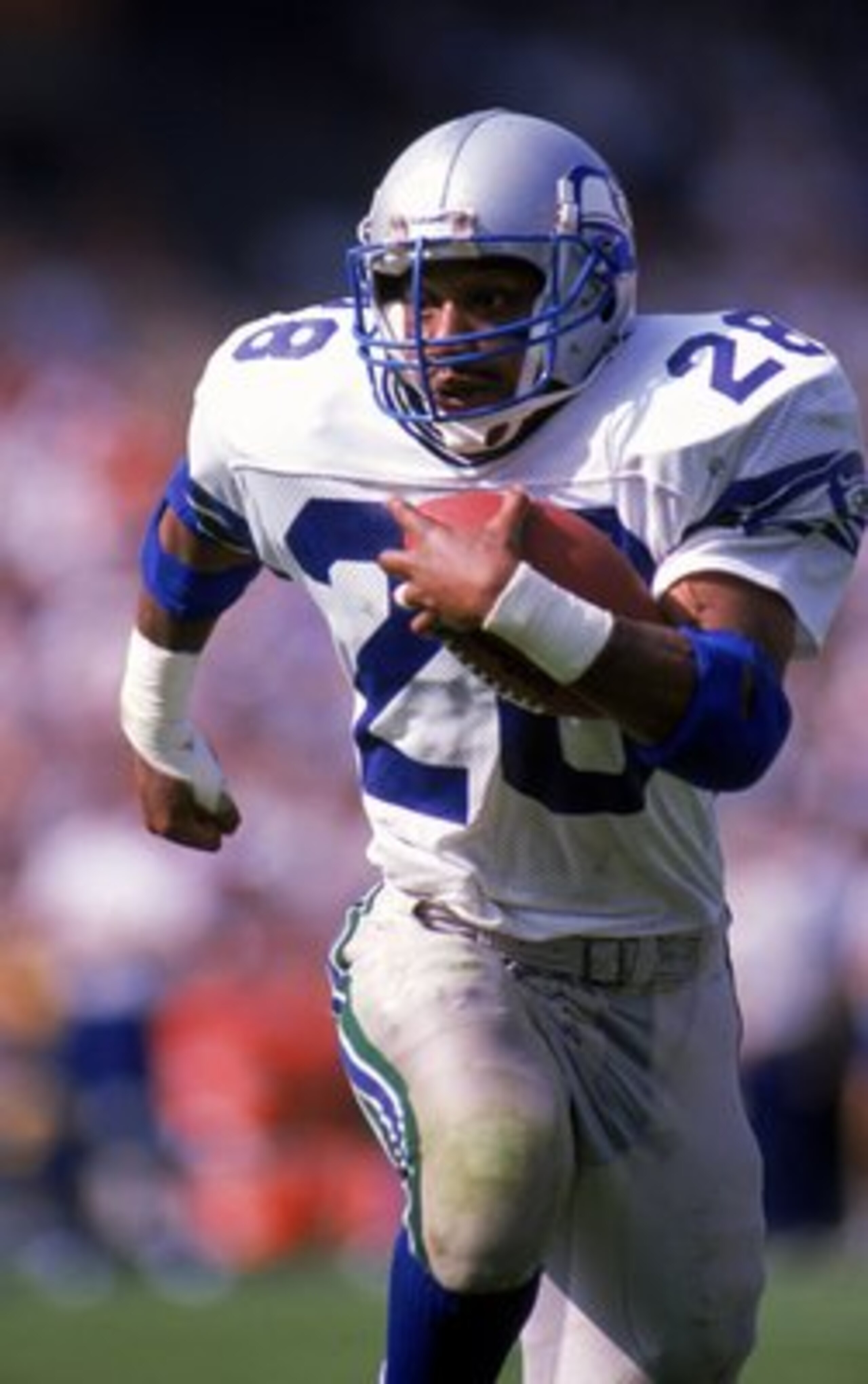 23 Oct 1988: Curt Warner #28 of the Seattle Seahawks runs with the ball during the game against the Los Angeles Rams. The Rams defeated the Seahawks 31-10. 23 Oct 1988: Curt Warner #28 of the Seattle Seahawks runs with the ball during the game against the Los Angeles Rams. The Rams defeated the Seahawks 31-10.