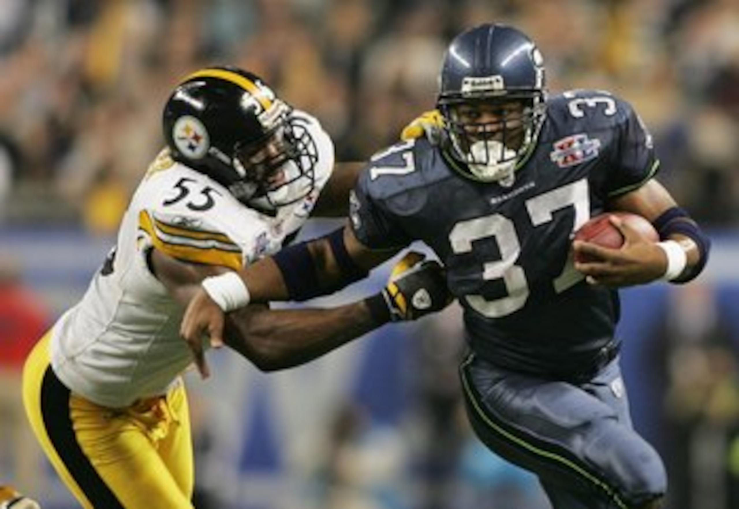 DETROIT - FEBRUARY 5: Running back Shaun Alexander #37 of the Seattle Seahawks tries to avoid a tackle by linebacker Joey Porter #55 of the Pittsburgh Steelers in the third quarter of Super Bowl XL at Ford Field on February 5, 2006 in Detroit, Michigan. DETROIT - FEBRUARY 5: Running back Shaun Alexander #37 of the Seattle Seahawks tries to avoid a tackle by linebacker Joey Porter #55 of the Pittsburgh Steelers in the third quarter of Super Bowl XL at Ford Field on February 5, 2006 in Detroit, Michigan.