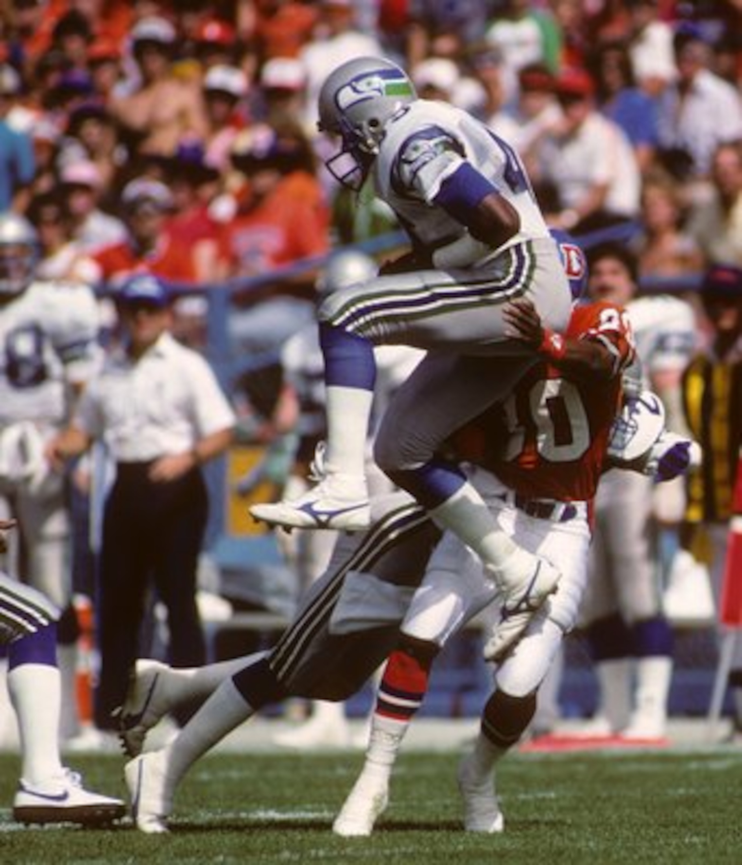 DENVER, CO - SEPTEMBER 13: Kenny Easley of the Seattle Seahawks intercepts a pass during the game against the Denver Broncos at Mile High Staduim on September 13, 1987 in Denver, Colorado. The Broncos won 40-17. (Photo by George Rose/Getty Images) DENVER, CO - SEPTEMBER 13: Kenny Easley of the Seattle Seahawks intercepts a pass during the game against the Denver Broncos at Mile High Staduim on September 13, 1987 in Denver, Colorado. The Broncos won 40-17. (Photo by George Rose/Getty Images)