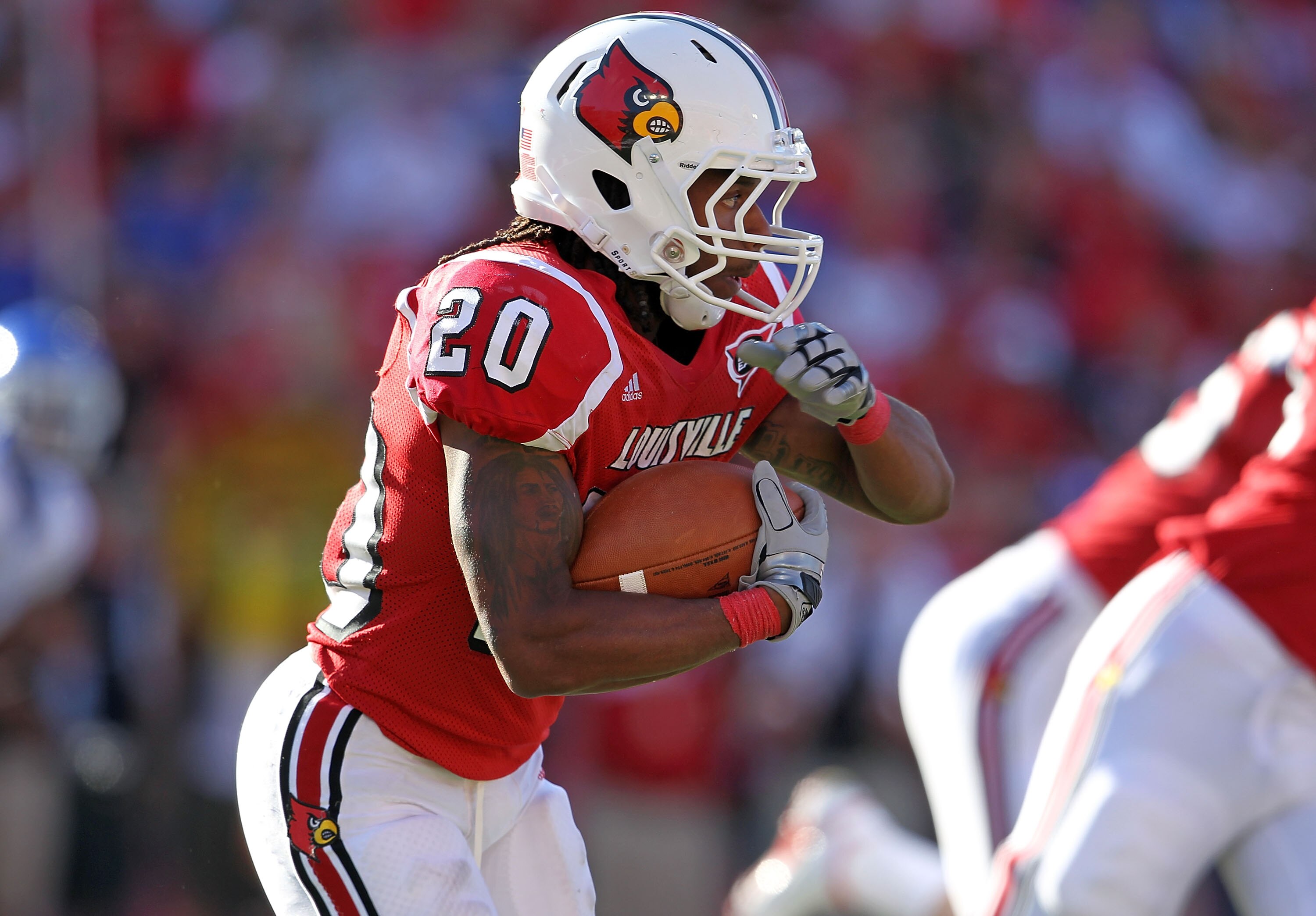 LOUISVILLE, KY - SEPTEMBER 04:  Victor Anderson #20 of the Louisville Cardinals runs with the ball during the game against the Kentucky Wildcats at Papa John's Cardinal Stadium on September 4, 2010 in Louisville, Kentucky.  (Photo by Andy Lyons/Getty Imag