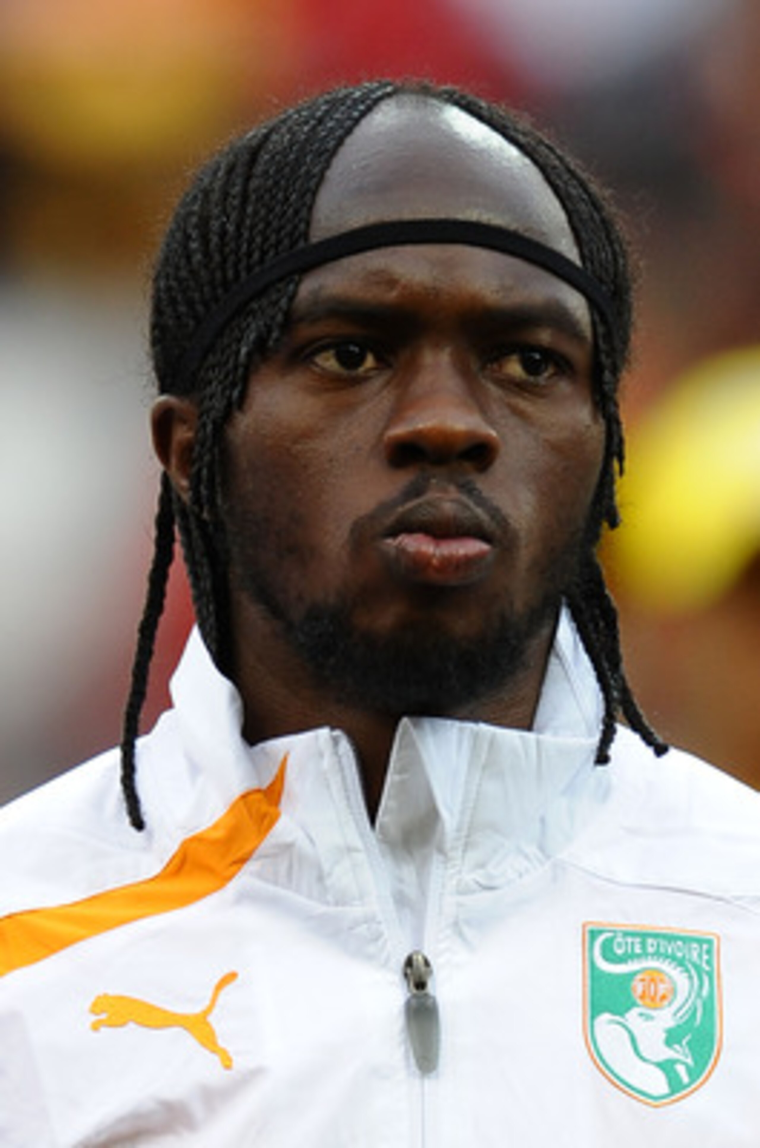 PORT ELIZABETH, SOUTH AFRICA - JUNE 15: Gervinho of Ivory Coast lines up for the national anthems prior to the 2010 FIFA World Cup South Africa Group G match between Ivory Coast and Portugal at Nelson Mandela Bay Stadium on June 15, 2010 in Port Elizabeth