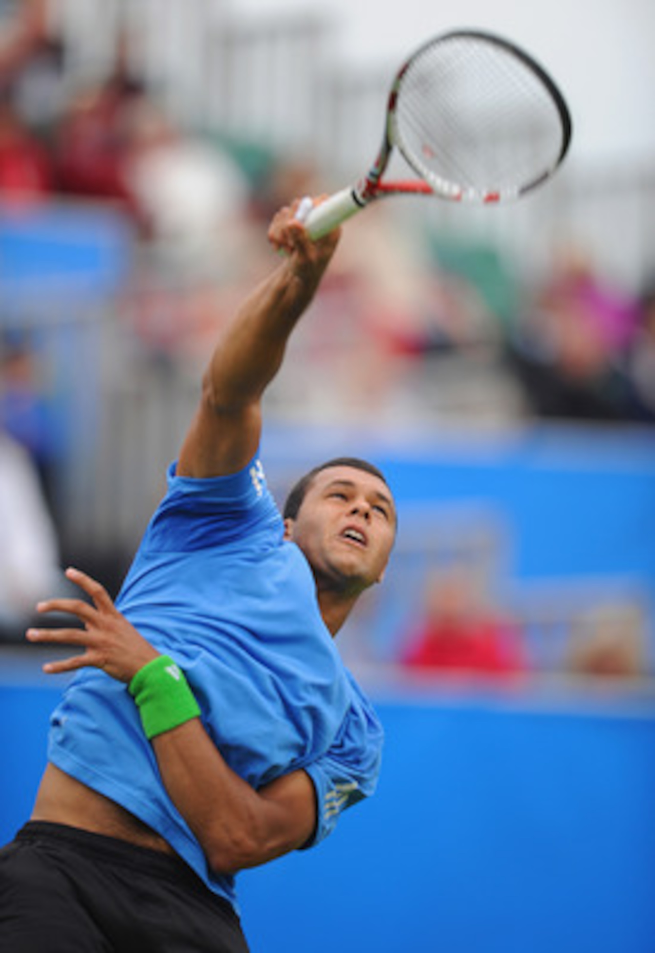 EASTBOURNE, ENGLAND - JUNE 15:  Jo-Wilfred Tsonga of France plays a shot in his match against Radek Stepanek of the Czech Republic during day 5 of the AEGON International tennis tournament on June 15, 2011 in Eastbourne, England.  (Photo by Michael Regan/