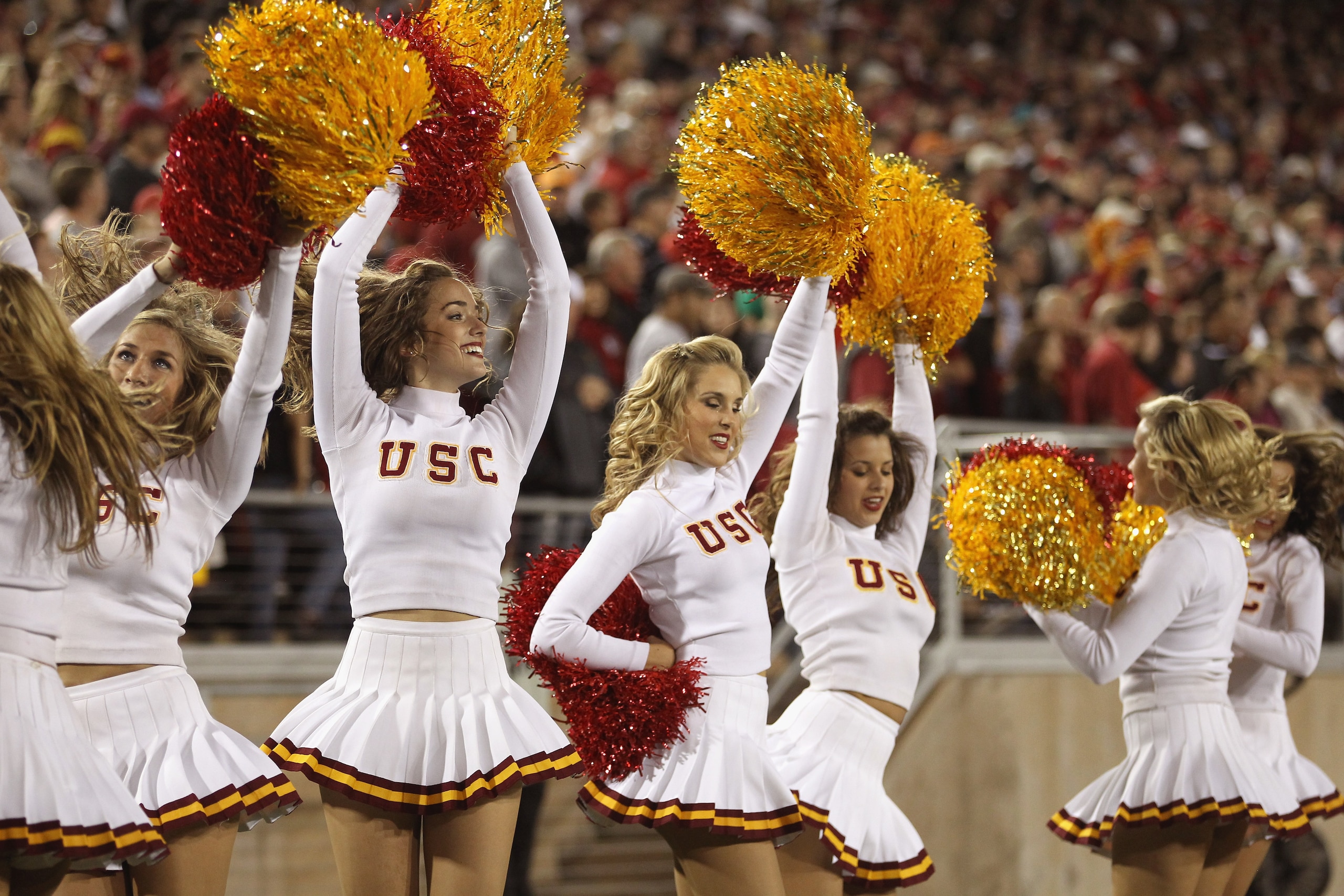 PALO ALTO, CA - OCTOBER 09:  The USC Trojan cheerleaders cheer for their team during their game against the Stanford Cardinal at Stanford Stadium on October 9, 2010 in Palo Alto, California.  (Photo by Ezra Shaw/Getty Images)