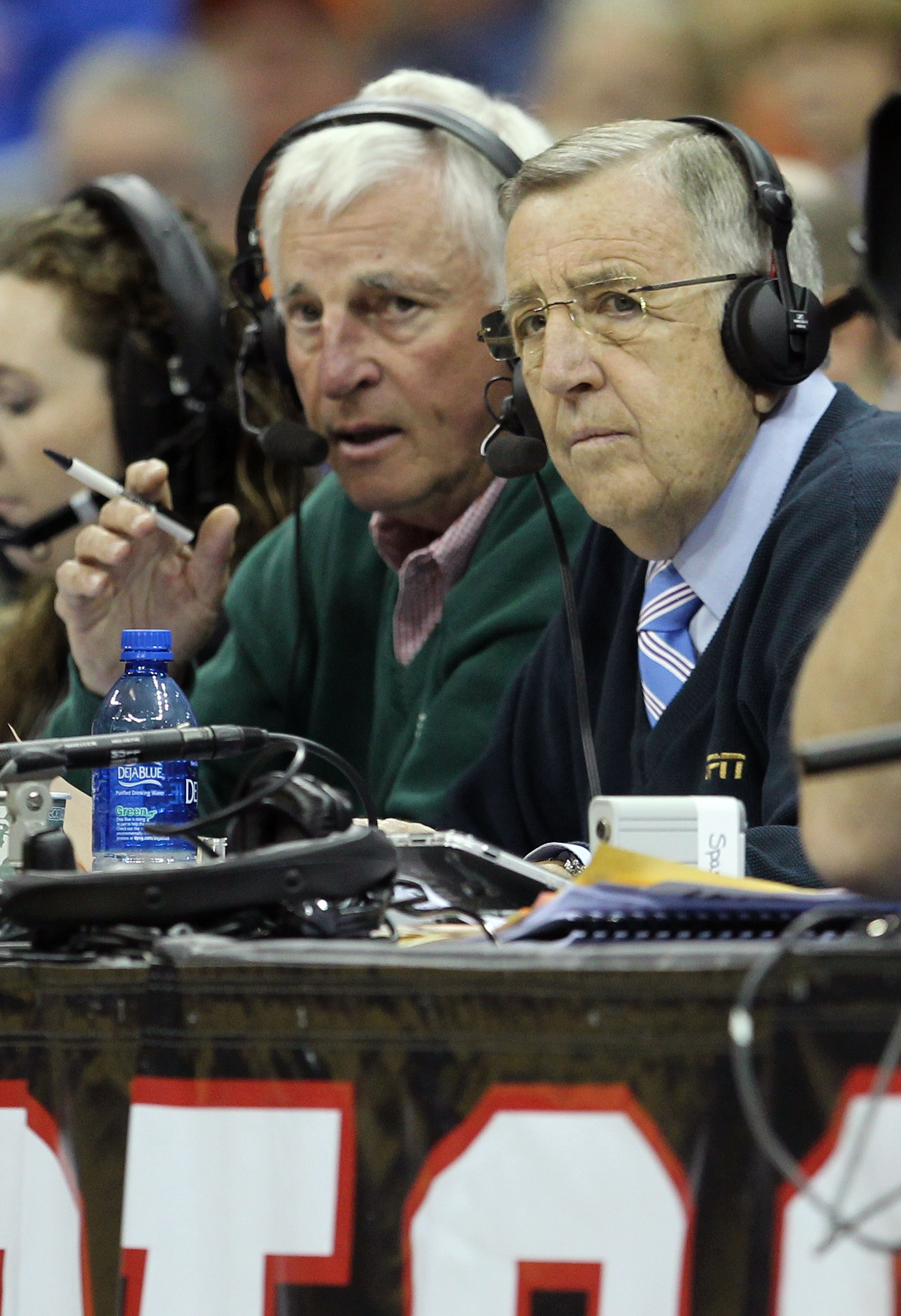 KANSAS CITY, MO - MARCH 10:  (L-R) ESPN analysts Bobby Knight and Brent Musburger call the game between the Oklahoma State Cowboys and the Kansas Jayhawks during their quarterfinal game in the 2011 Phillips 66 Big 12 Men's Basketball Tournament at Sprint
