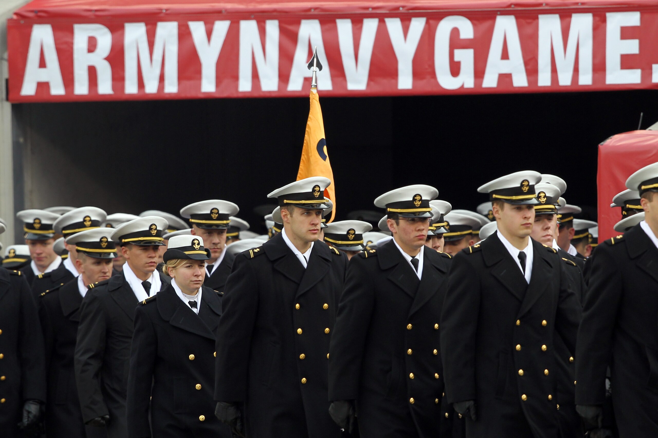 PHILADELPHIA - DECEMBER 11: The Navy Midshipmen march onto the field before the game against the Army Black Knights on December 11, 2010 at Lincoln Financial Field in Philadelphia, Pennsylvania. (Photo by Hunter Martin/Getty Images)